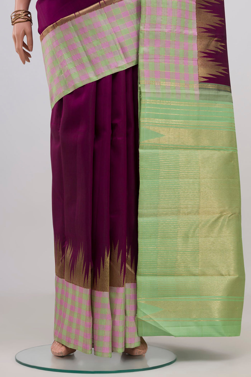 Pleats and pallu of Pure Silk Pure Zari Purple Kanchipuram Saree with Plain Body and Checks Border. 