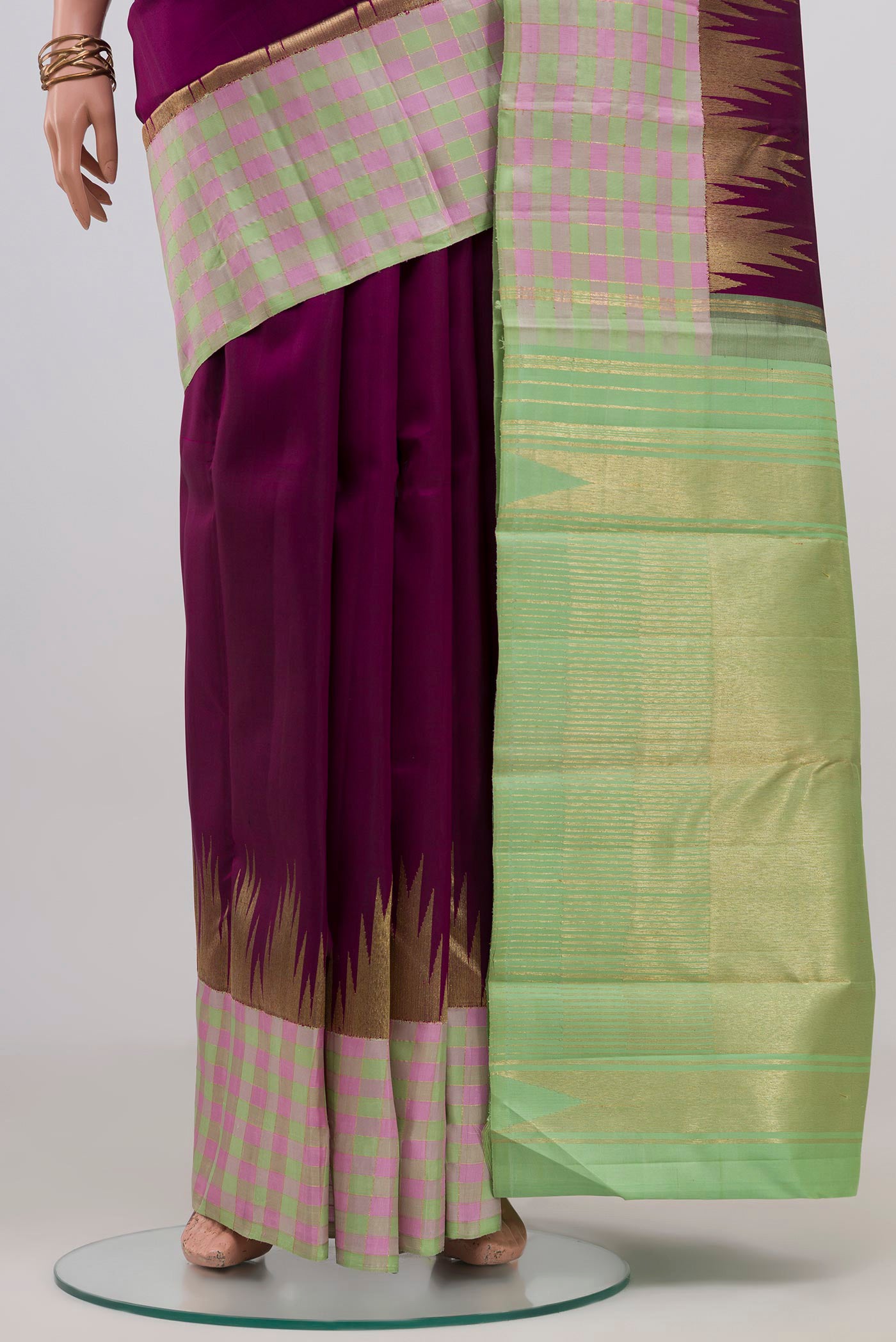 Pleats and pallu of Pure Silk Pure Zari Purple Kanchipuram Saree with Plain Body and Checks Border. 