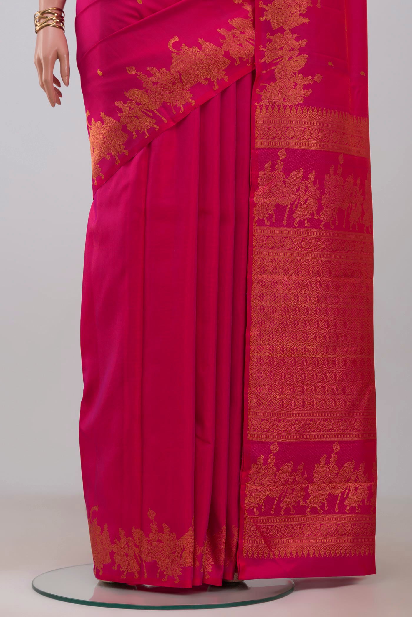 Pleats and pallu of Pink Kanjivaram Silk Saree with Zari Butta on the body and Fancy Border. 