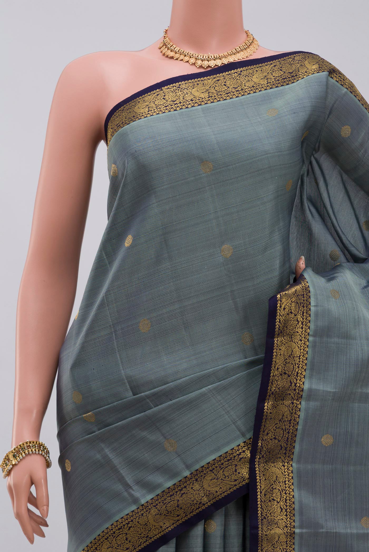 Border image of Pure Silk Pure Zari Grey Kanchipuram Saree with Zari Butta on the body and Zari Border. 