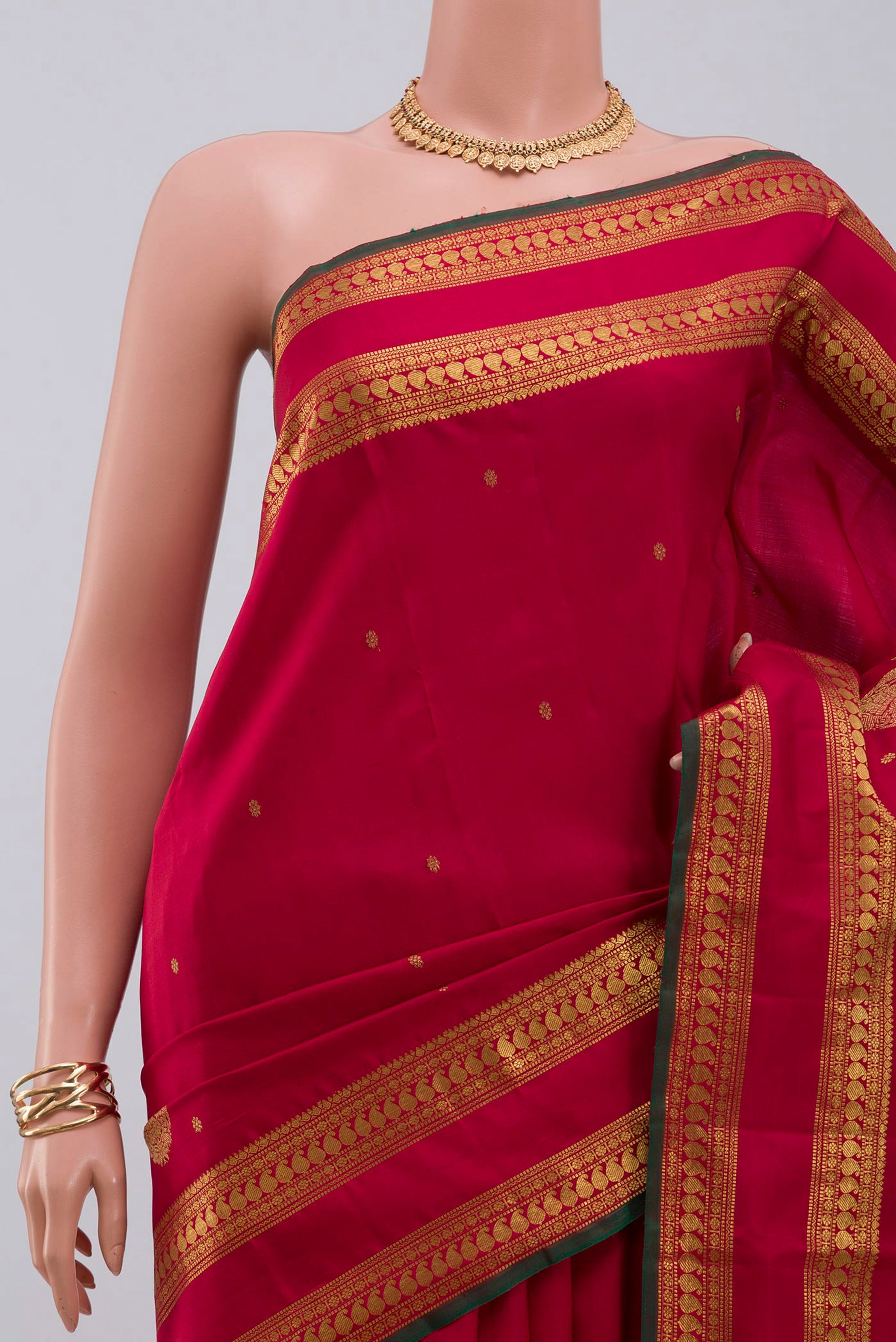 Border image of Pure Silk Pure Zari Maroon Kanchipuram Saree with Zari Butta on the body and Zari Border. 