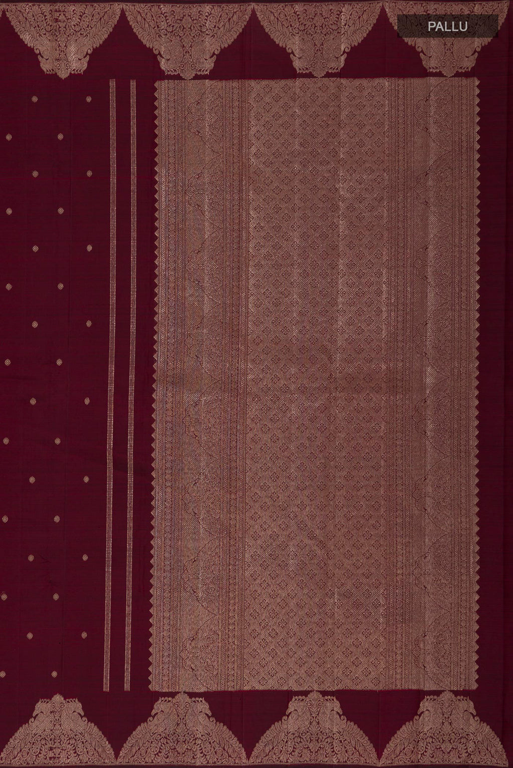Close up image of the pallu of Pure Silk Pure Zari Maroon Kanjivaram Saree with Zari Butta on the body and Fancy Border. 