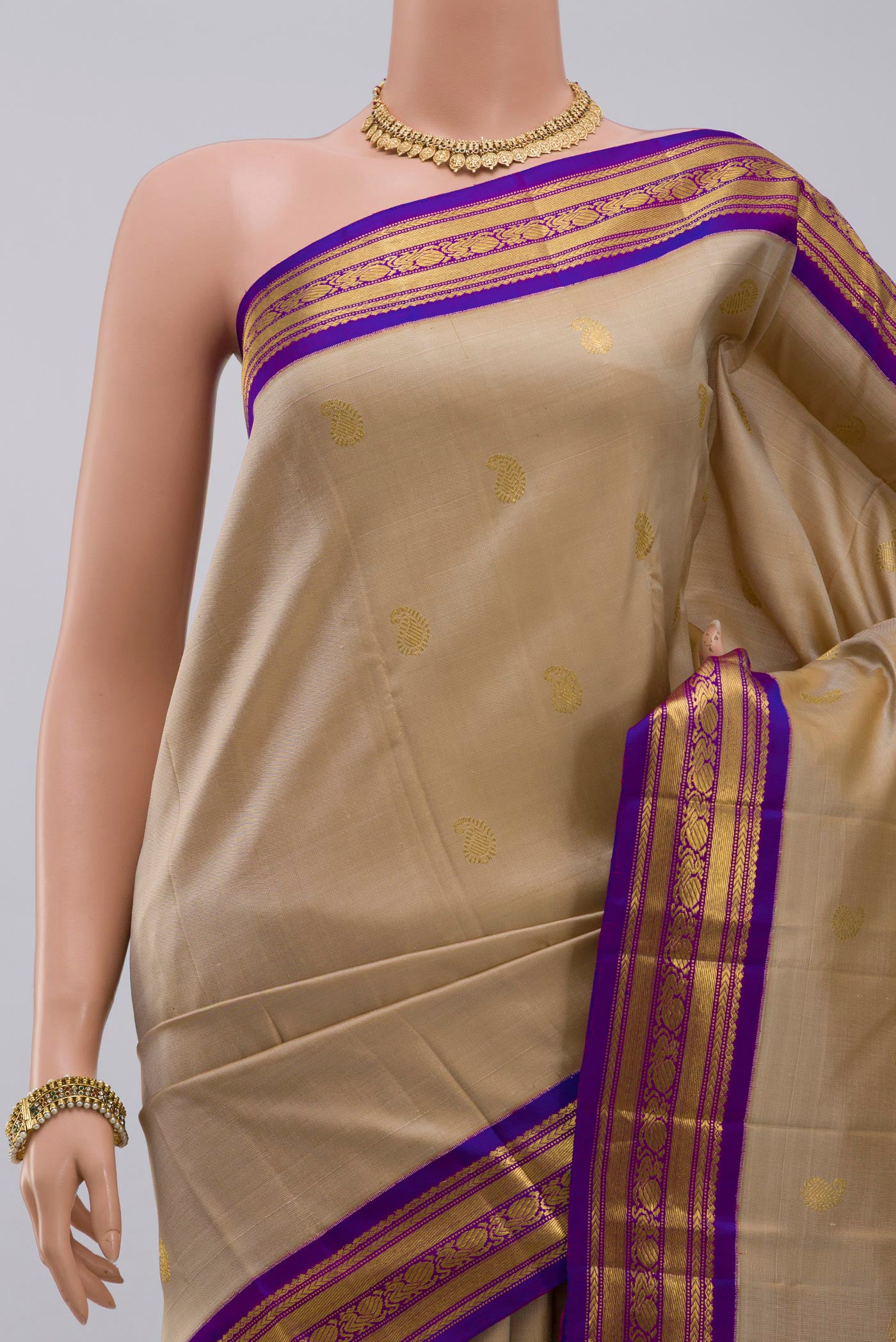 Border image of Pure Silk Pure Zari Cream Kanchipuram Saree with Zari Butta on the body and Zari Border. 
