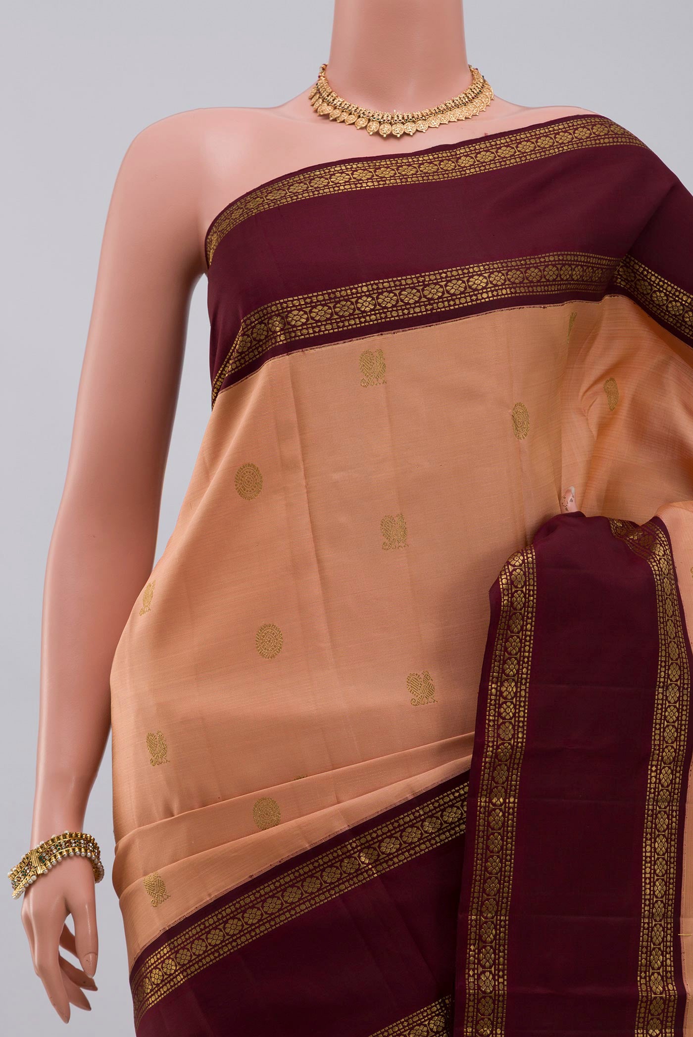 Border image of Pure Silk Pure Zari Peach Kanchipuram Saree with Zari Butta on the body and Zari Border. 