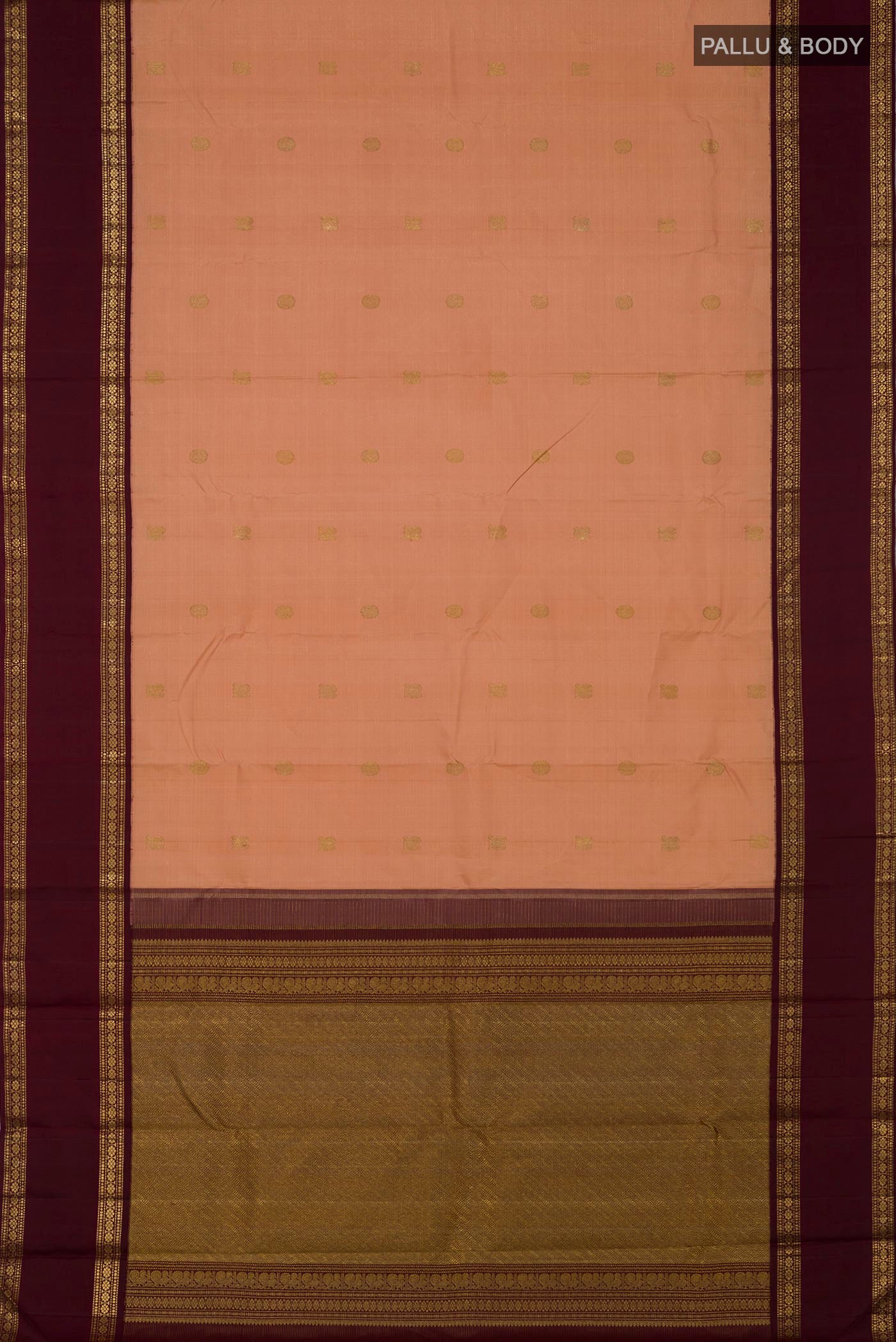 Flat view of Pure Silk Pure Zari Peach Kanchipuram Saree with Zari Butta on the body and Zari Border. 