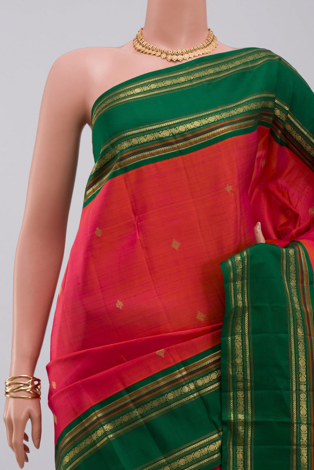 Border image of Pure Silk Pure Zari Orange Kanchipuram Saree with Zari Butta on the body and Zari Border. 