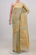 Pure Silk Beige Kanchipuram Saree with Thread Butta on the body and Zari Border.  displayed on a mannequin
