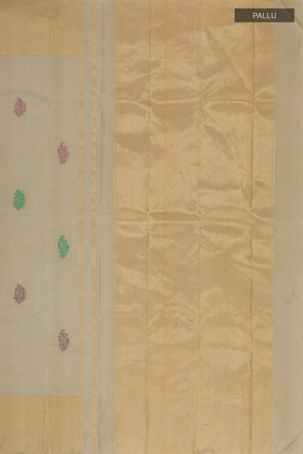 Close up image of the pallu of Pure Silk Beige Kanchipuram Saree with Thread Butta on the body and Zari Border. 