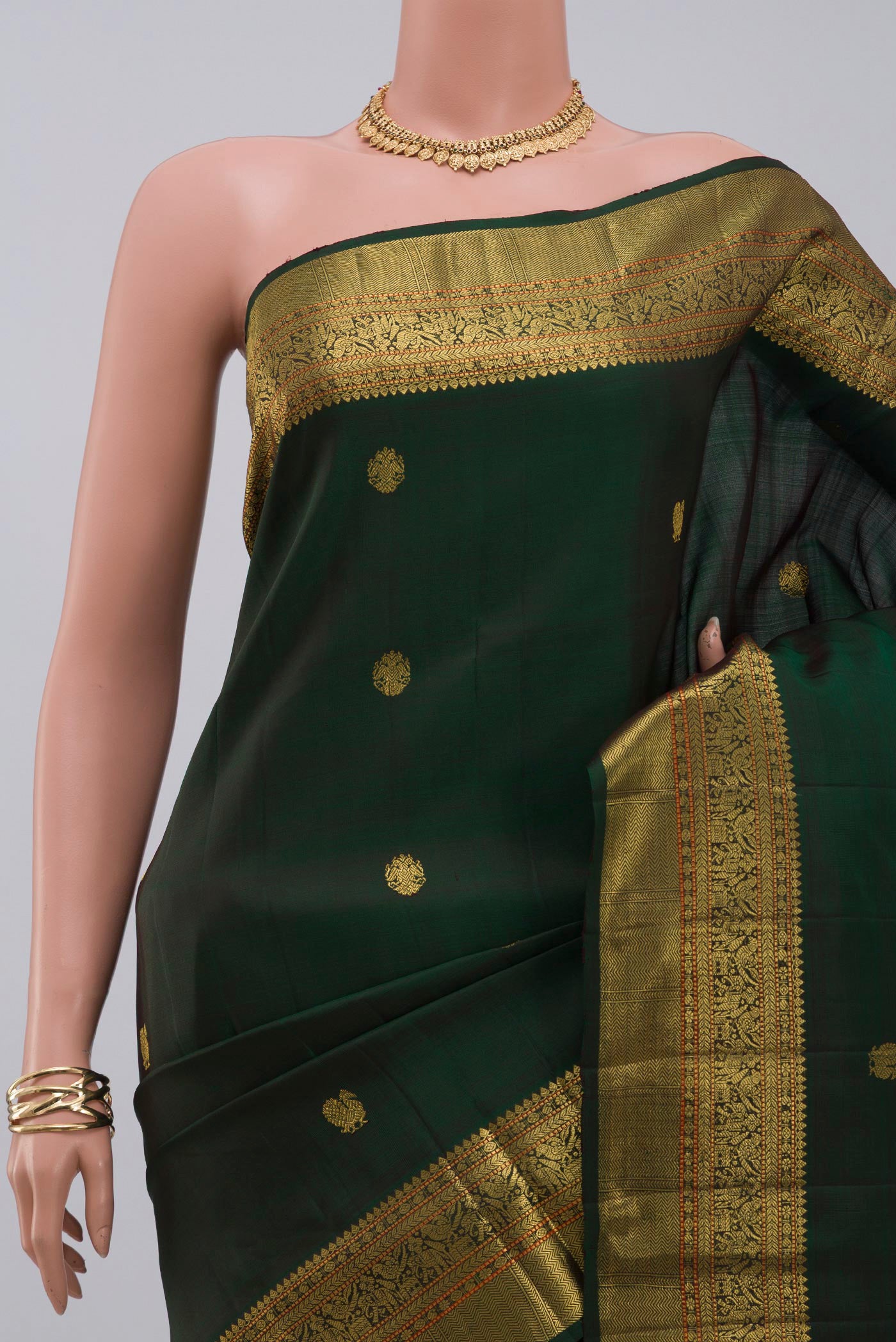 Border image of Pure Silk Pure Zari Green Kanjivaram Saree with Zari Butta on the body and Zari Border. 