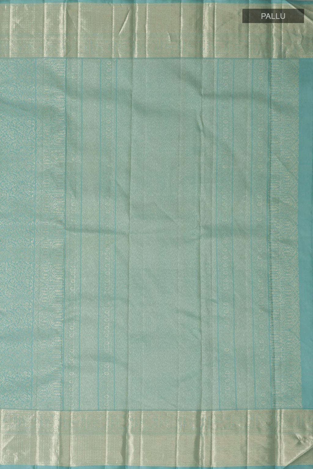 Close up image of the pallu of Light Blue Kanchipuram Silk Saree with Zari Brocade on the body and Zari Border. 