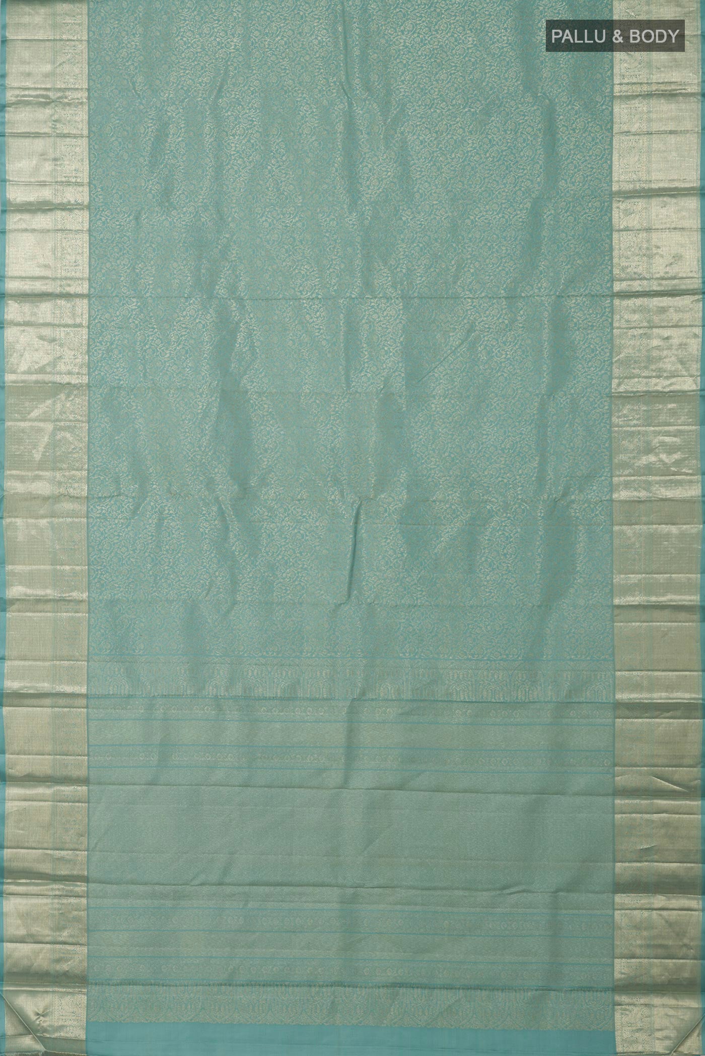 Flat view of Light Blue Kanchipuram Silk Saree with Zari Brocade on the body and Zari Border. 