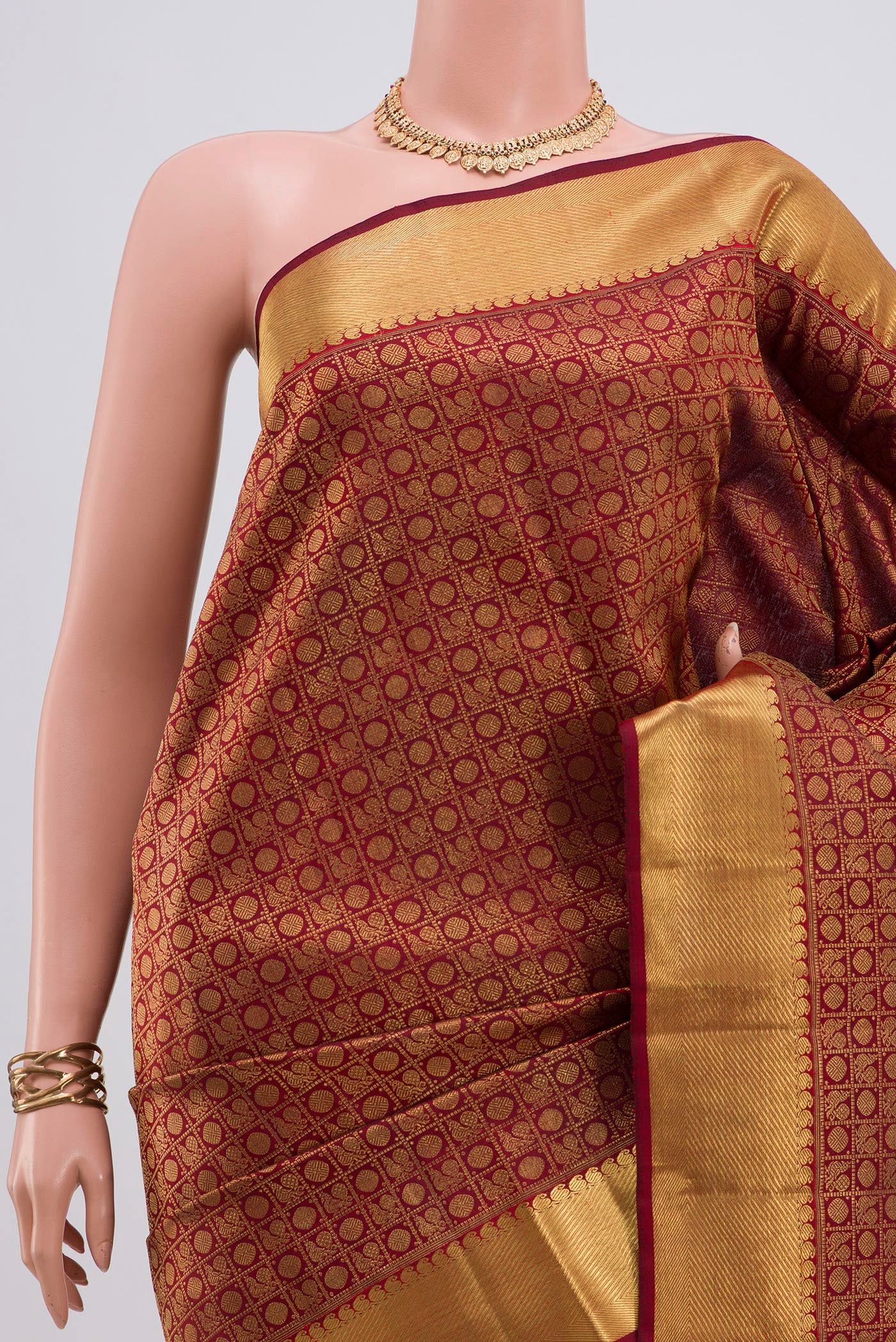 Border image of Pure Silk Pure Zari Maroon Kanjivaram Saree with Zari Brocade on the body and Zari Border. 