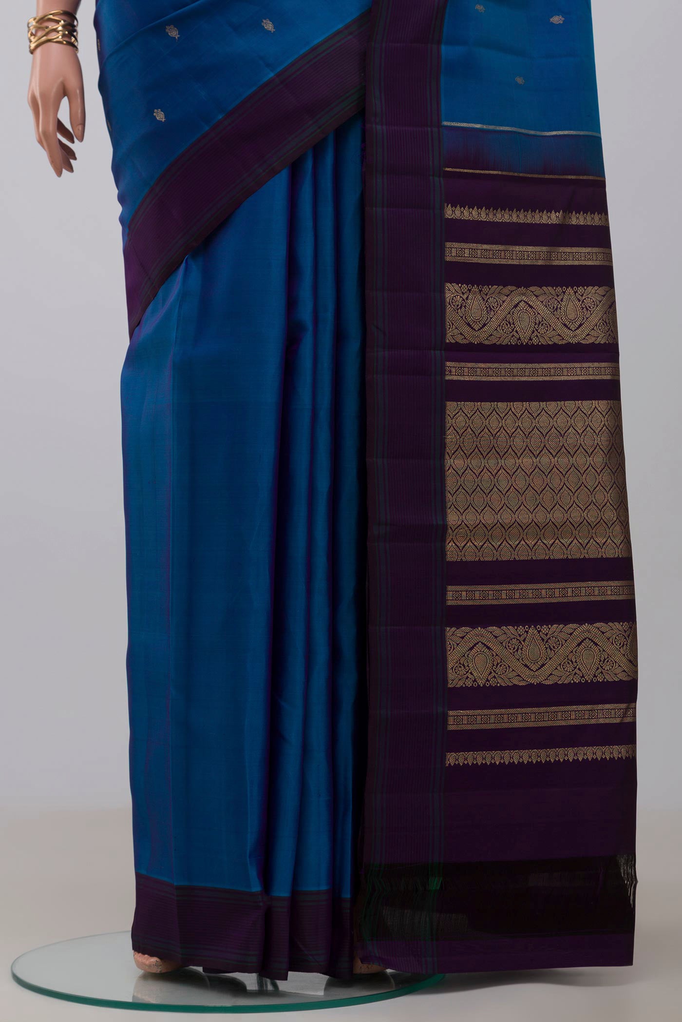 Pleats and pallu of Blue Kanchipuram Silk Saree with Zari Butta on the body and Plain Border. 