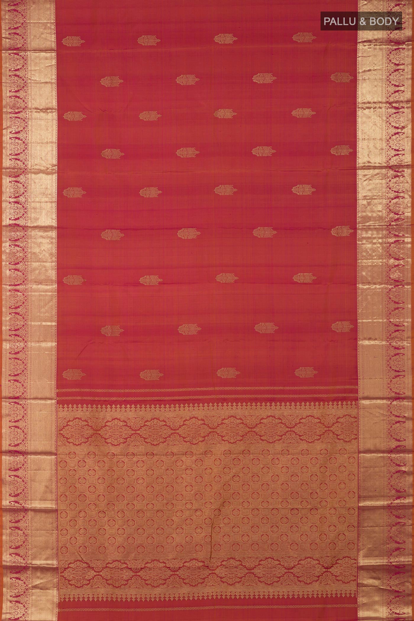 Flat view of Orange Kanchipuram Silk Saree with Zari Butta on the body and Zari Border. 