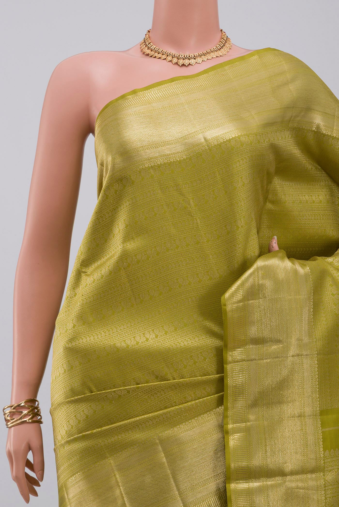 Border image of Green Kanchipuram Saree with Zari Brocade on the body and Zari Border. 