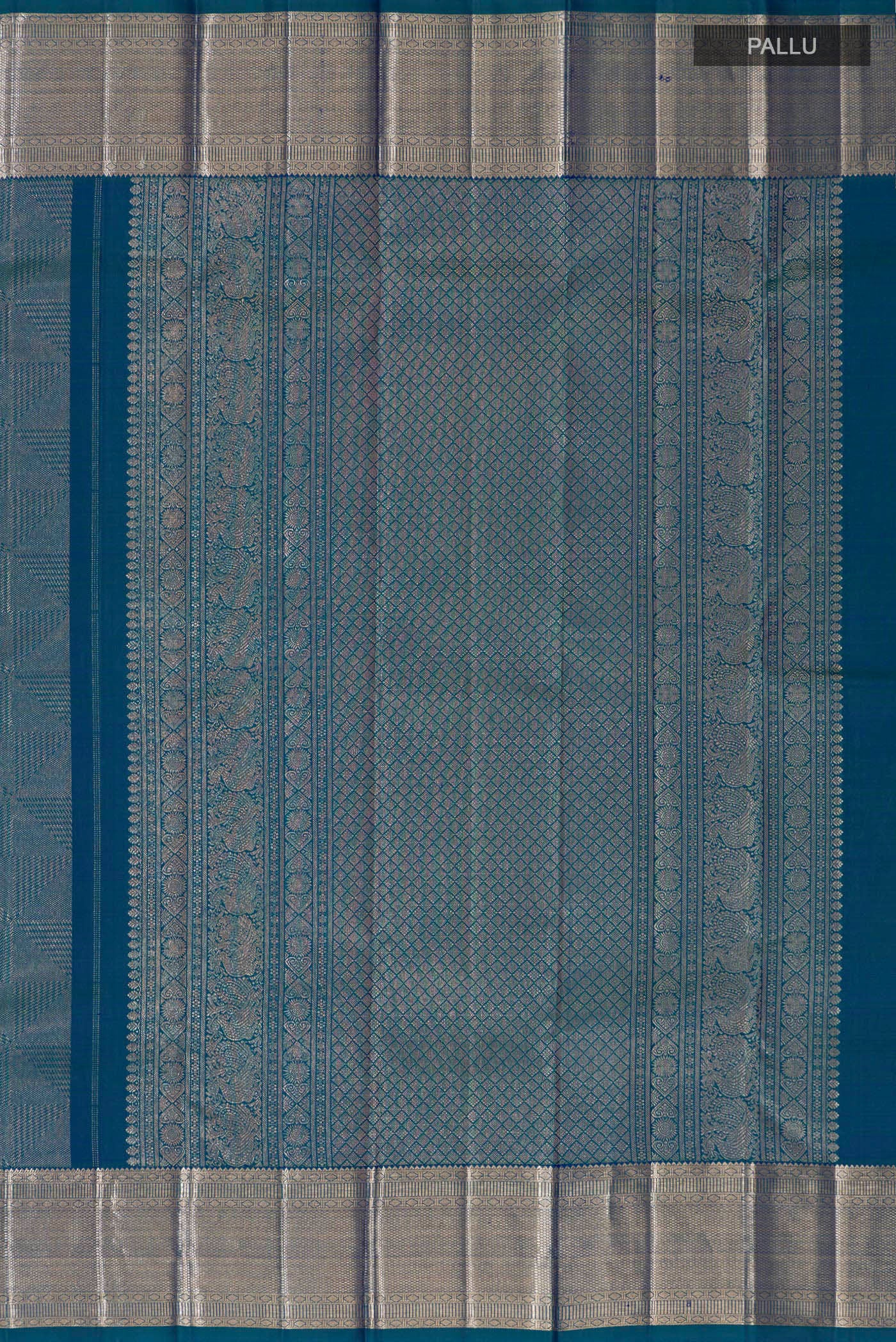 Close up image of the pallu of Blue Kanchipuram Silk Saree with Zari Brocade on the body and Zari Border. 