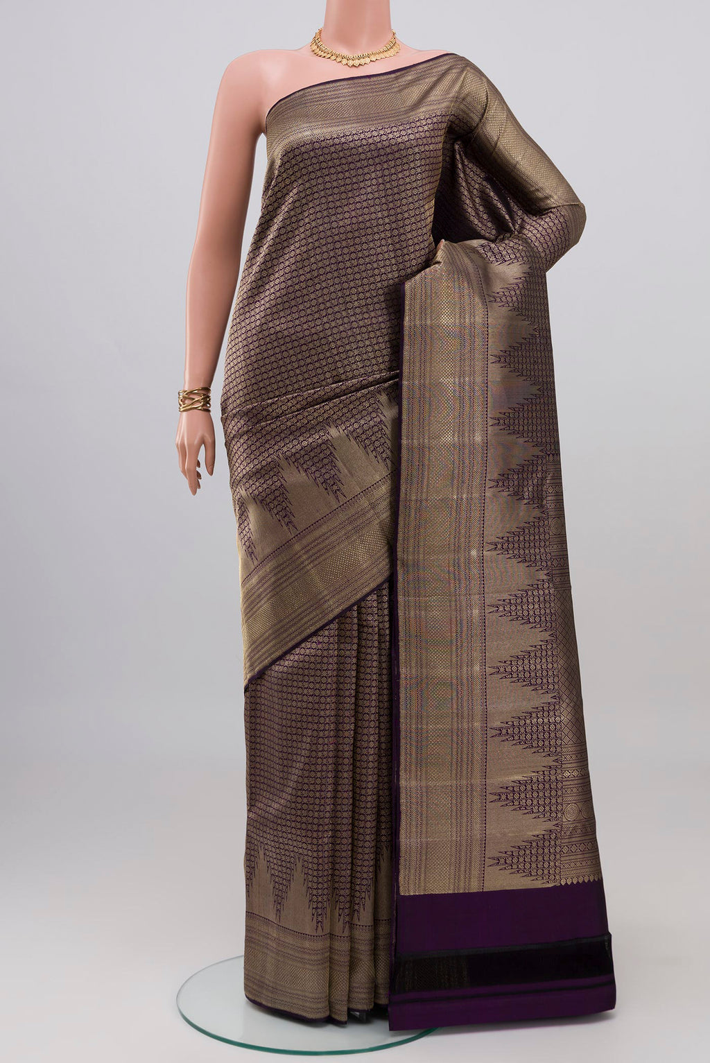 Navy Blue Kanchipuram Silk Saree with Zari Brocade on the body and Zari Border.  displayed on a mannequin