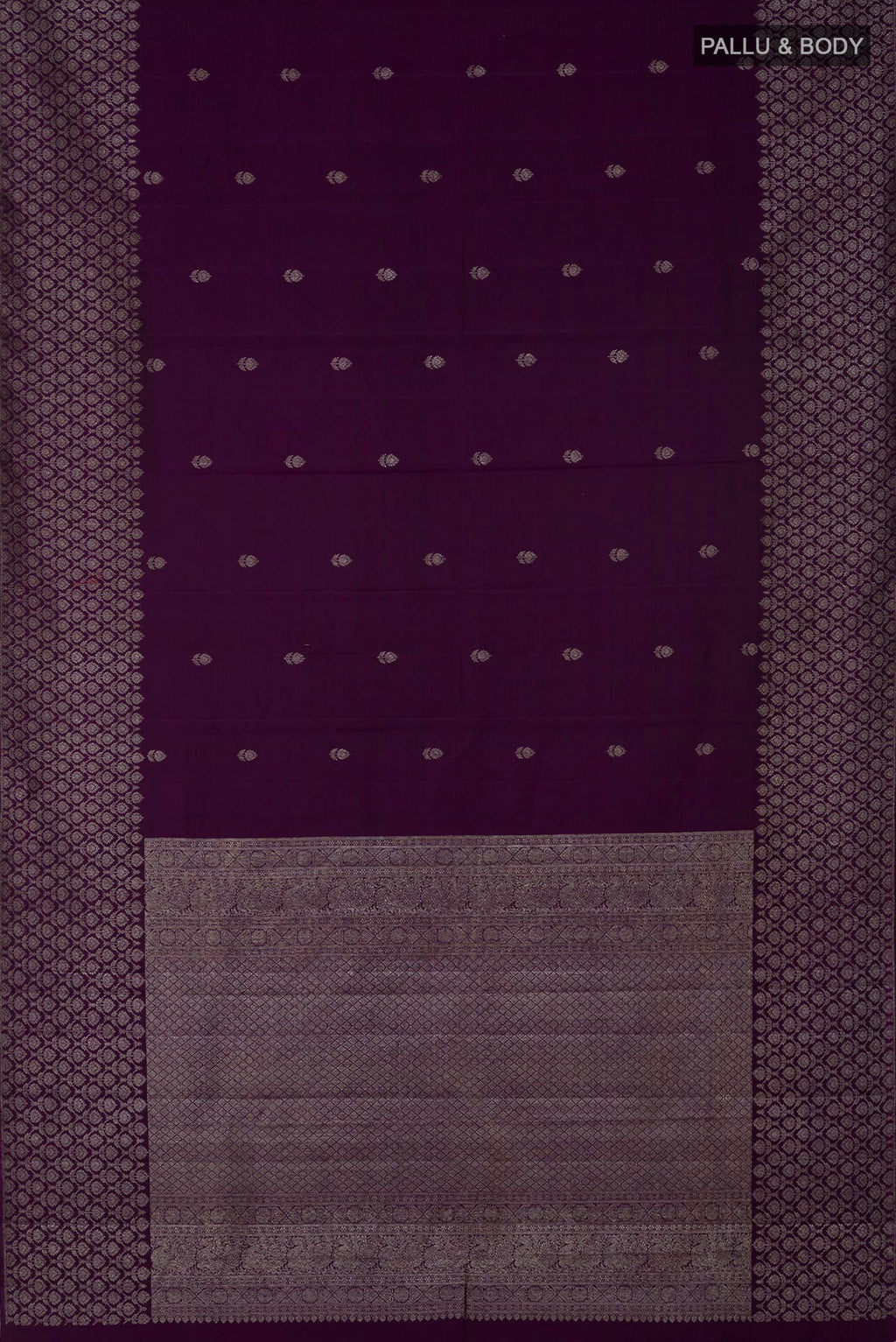 Flat view of Purple Kanjivaram Silk Saree with Zari Butta on the body and Zari Border. 