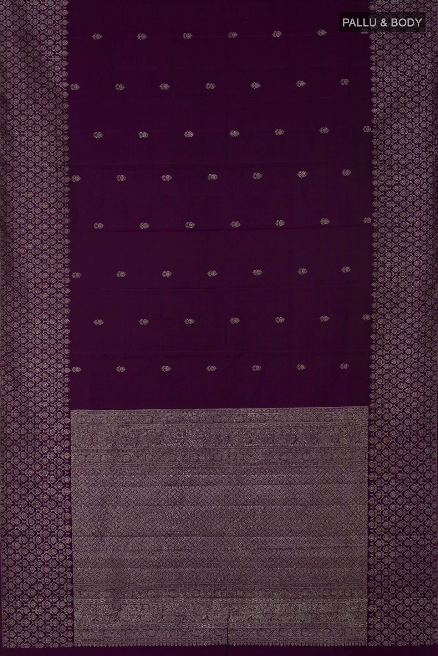 Flat view of Purple Kanjivaram Silk Saree with Zari Butta on the body and Zari Border. 