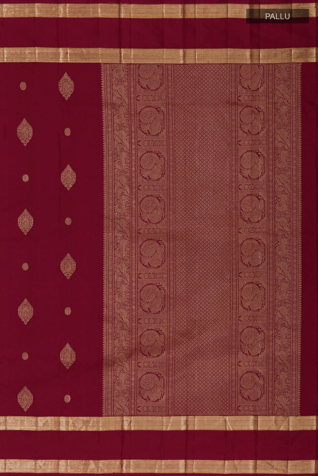 Close up image of the pallu of Maroon Kanjivaram Silk Saree with Zari Butta on the body and Zari Border. 