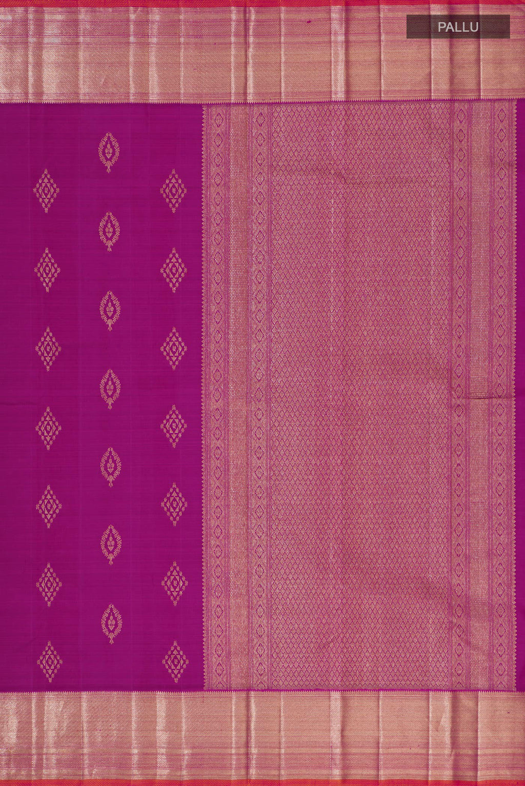 Close up image of the pallu of Magenta Kanjivaram Silk Saree with Zari Butta on the body and Zari Border. 