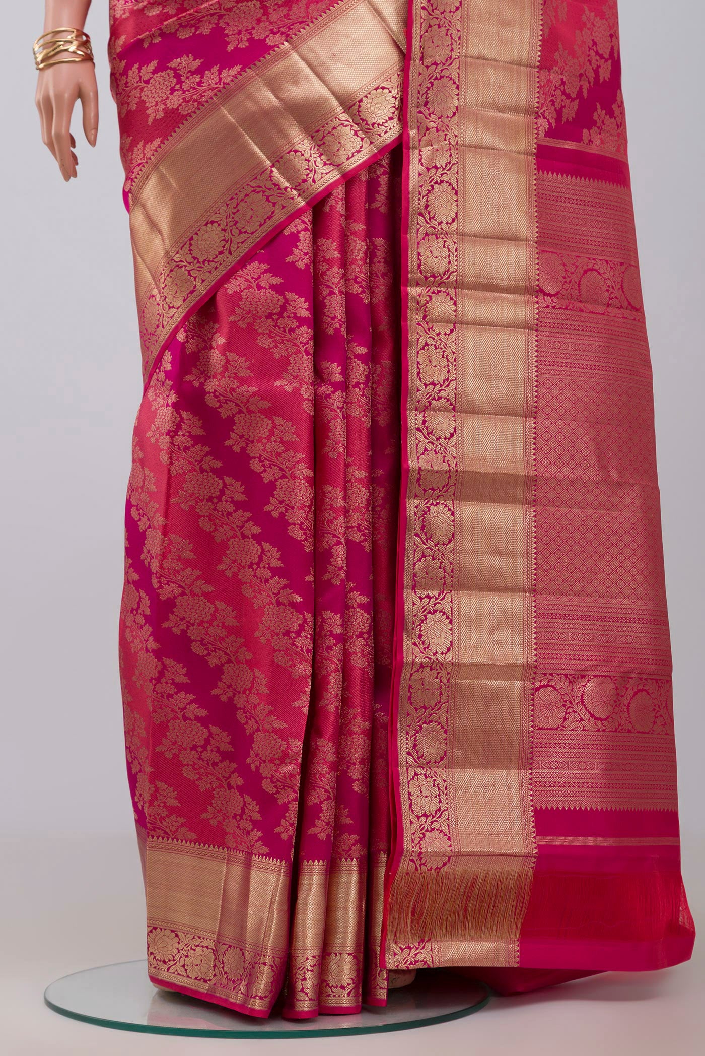 Pleats and pallu of Pink Kanjivaram Silk Saree with Zari Brocade on the body and Zari Border. 