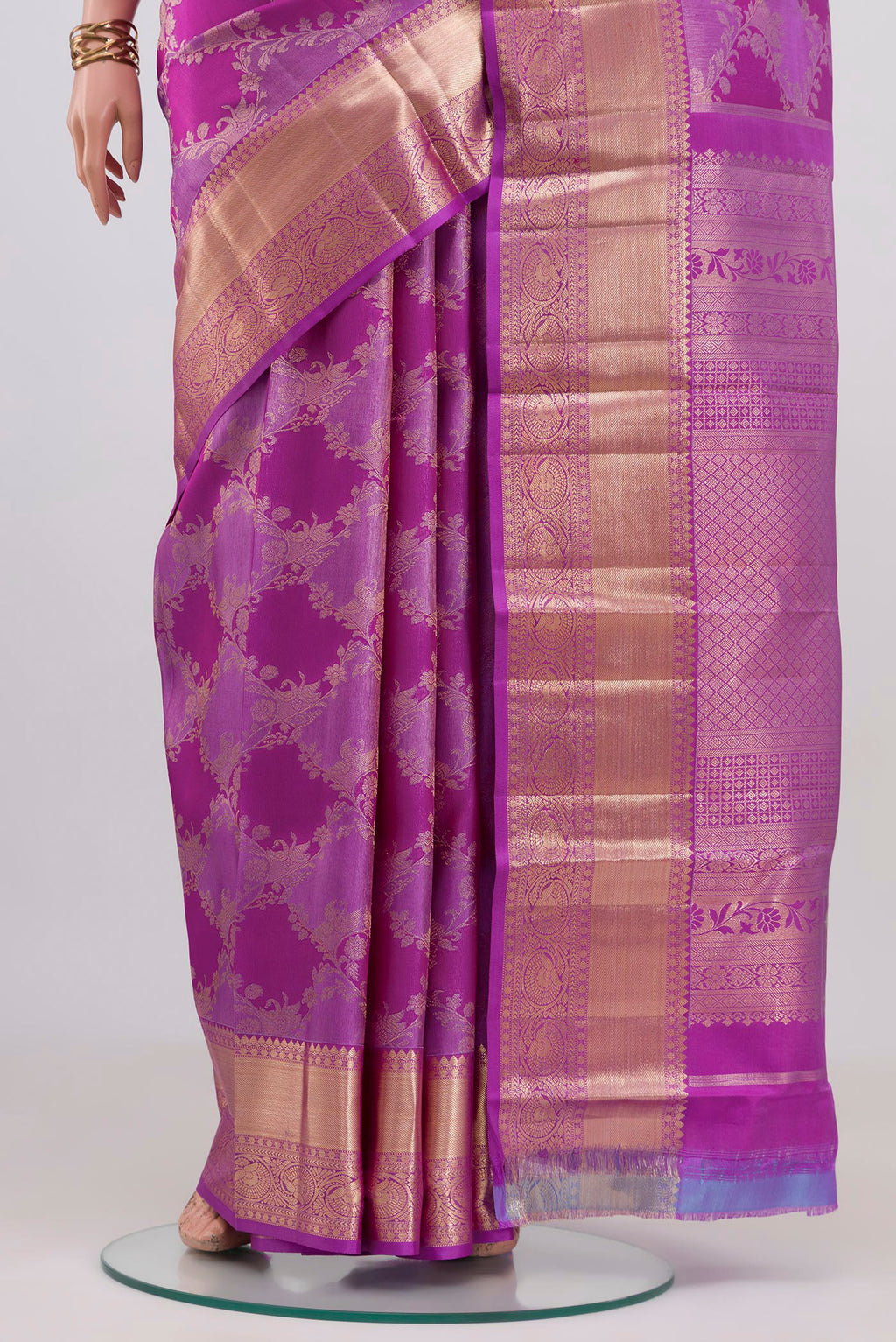 Pleats and pallu of Purple Kanjivaram Silk Saree with Zari Brocade on the body and Zari Border. 