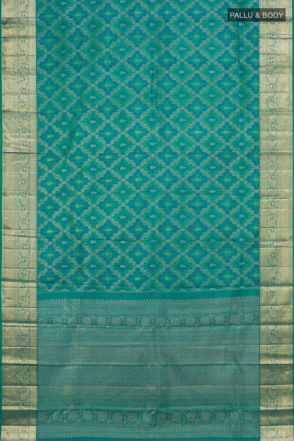 Flat view of Blue Dual Tone Kanjivaram Silk Saree with Zari Brocade on the body and Zari Border. 
