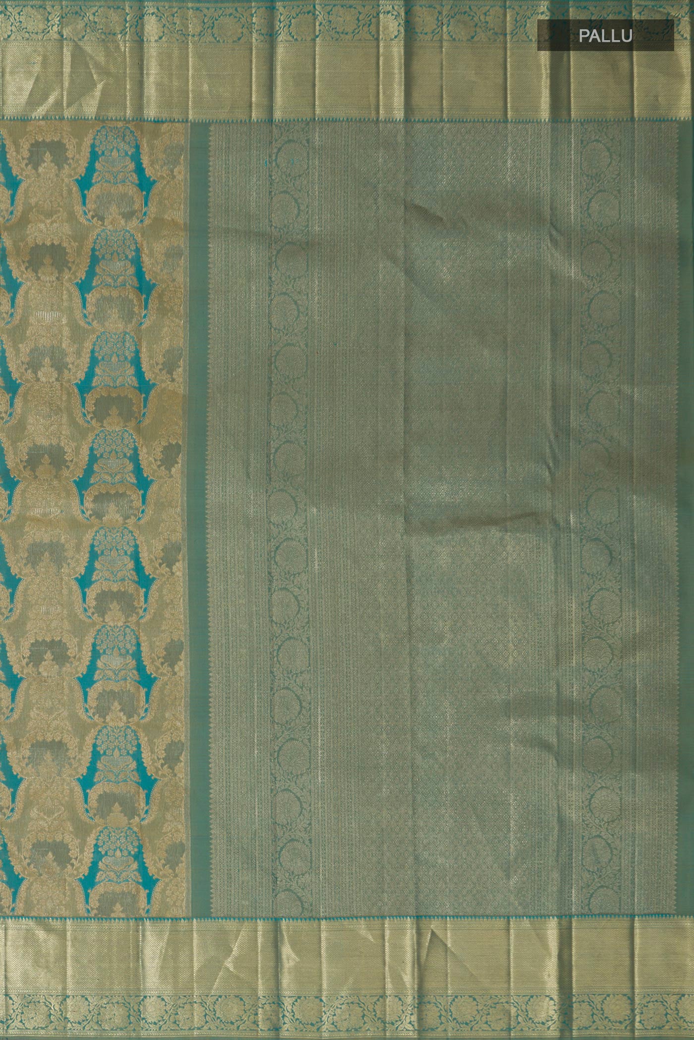 Close up image of the pallu of Blue Kanjivaram Silk Saree with Zari Brocade on the body and Zari Border. 