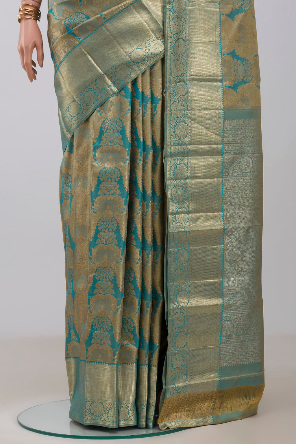 Pleats and pallu of Blue Kanjivaram Silk Saree with Zari Brocade on the body and Zari Border. 
