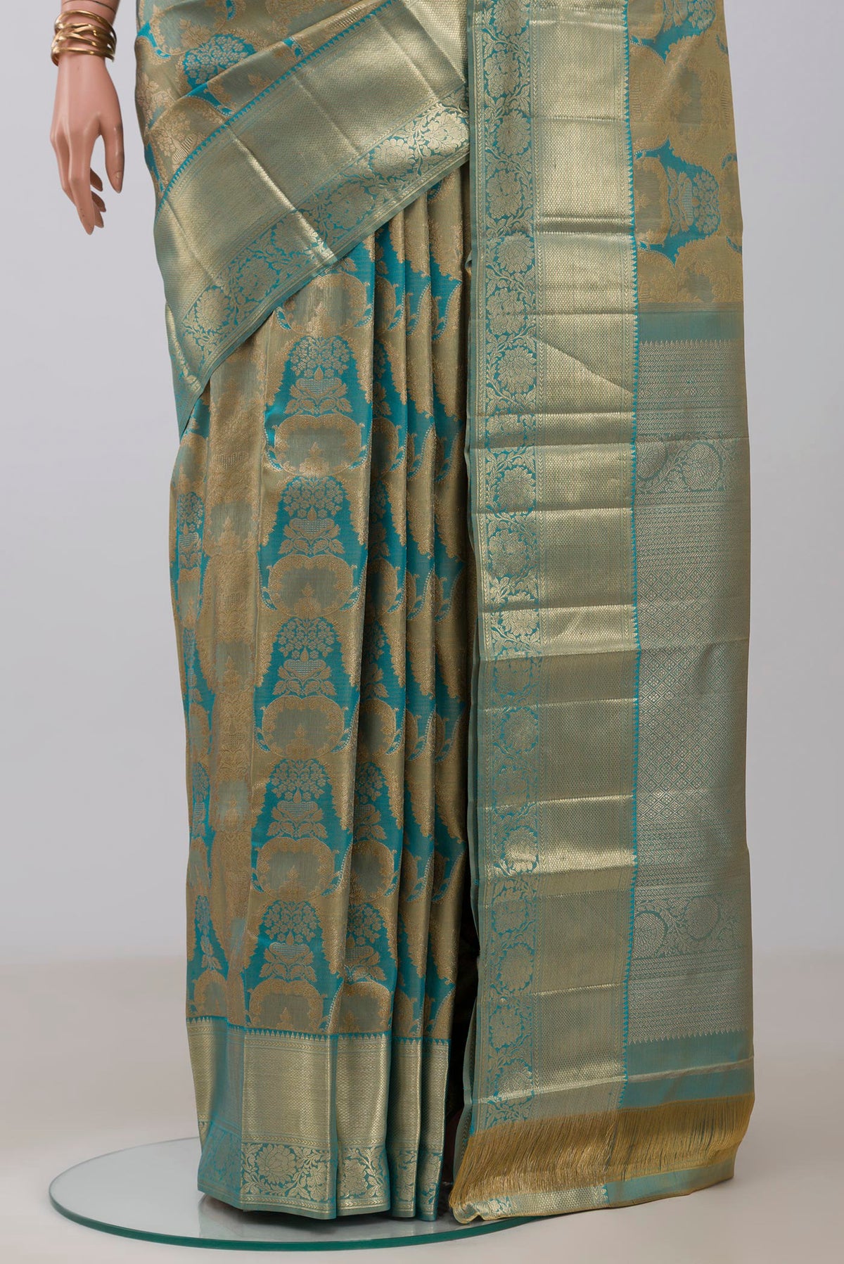 Pleats and pallu of Blue Kanjivaram Silk Saree with Zari Brocade on the body and Zari Border. 