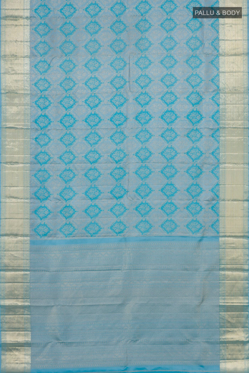 Flat view of Sky Blue Kanjivaram Silk Saree with Zari Brocade on the body and Zari Border. 