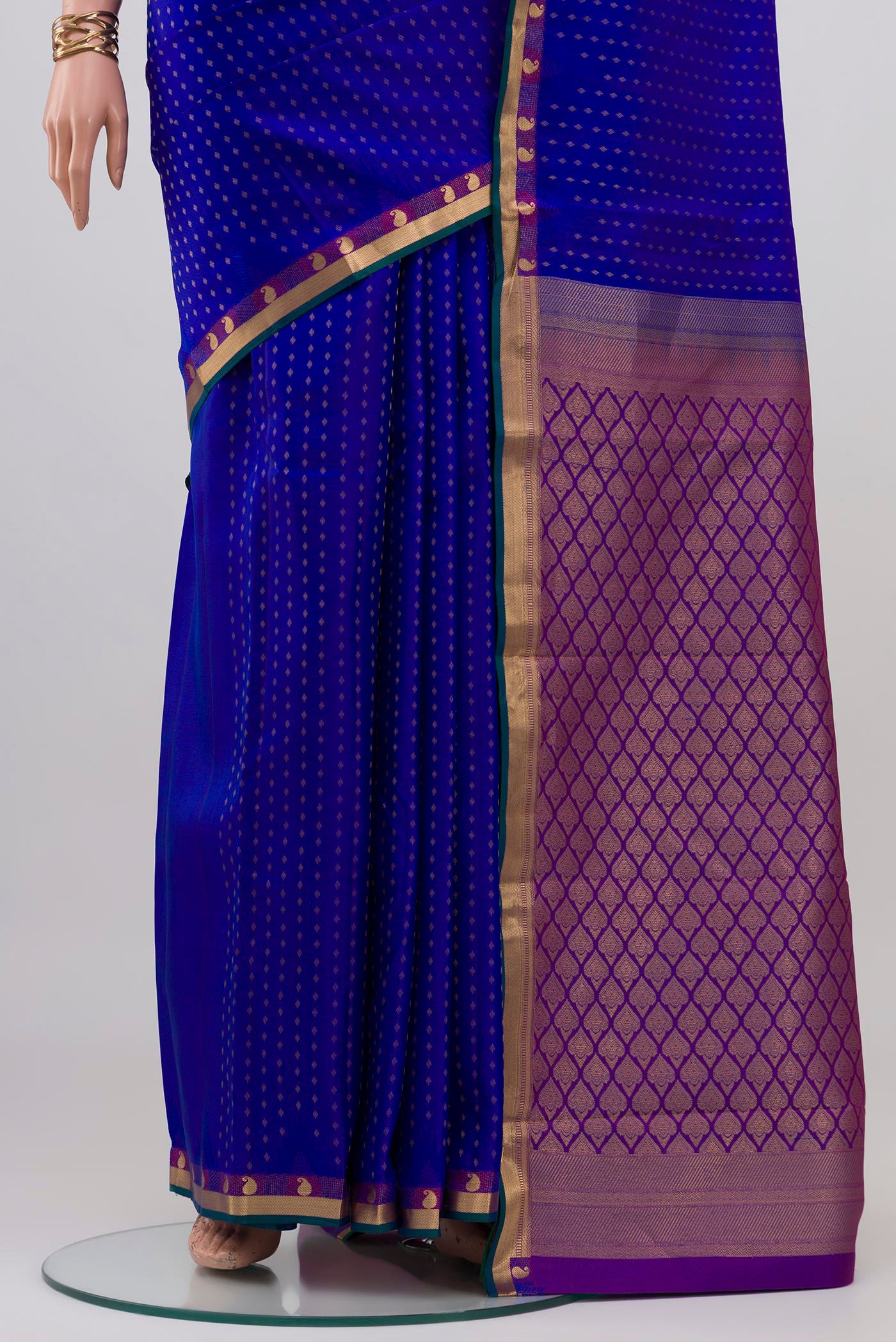 Pleats and pallu of Royal Blue Kanchipuram Silk Saree with Zari Butta on the body and Zari Border. 