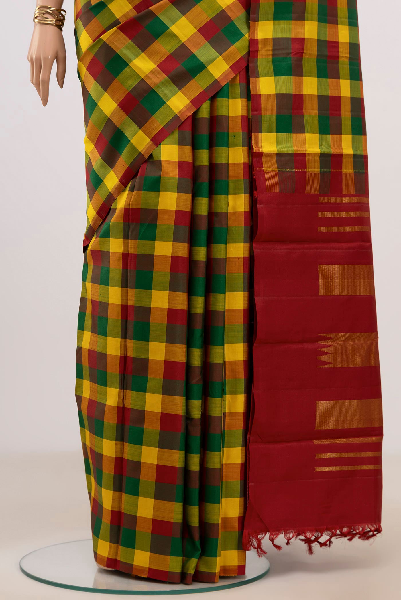 Pleats and pallu of Multi Color Kanchipuram Silk Saree with Checked design on the body and Without Border. 