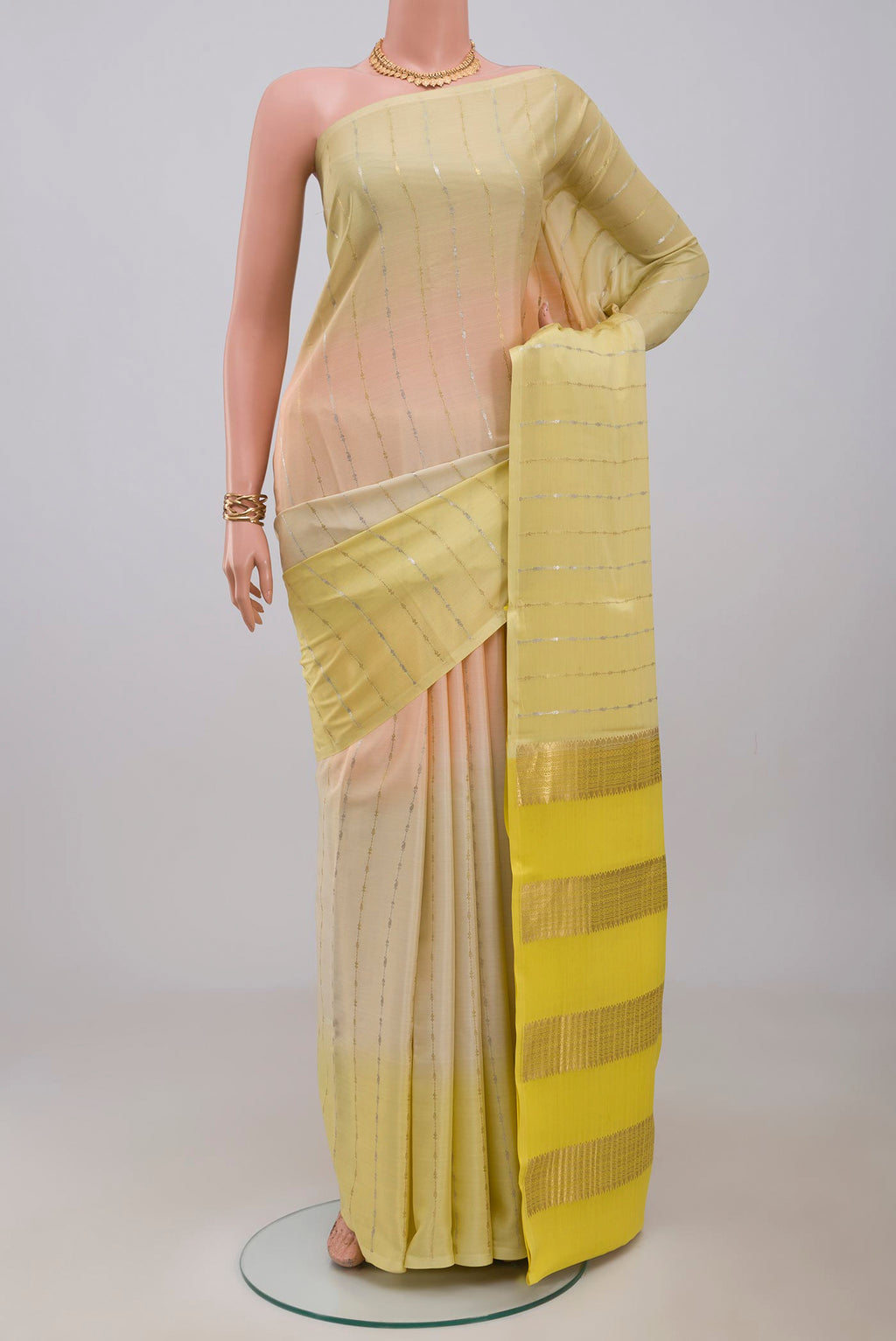 Multi Color Mysore Crepe Saree with Stripes on the body and Without Border.  displayed on a mannequin