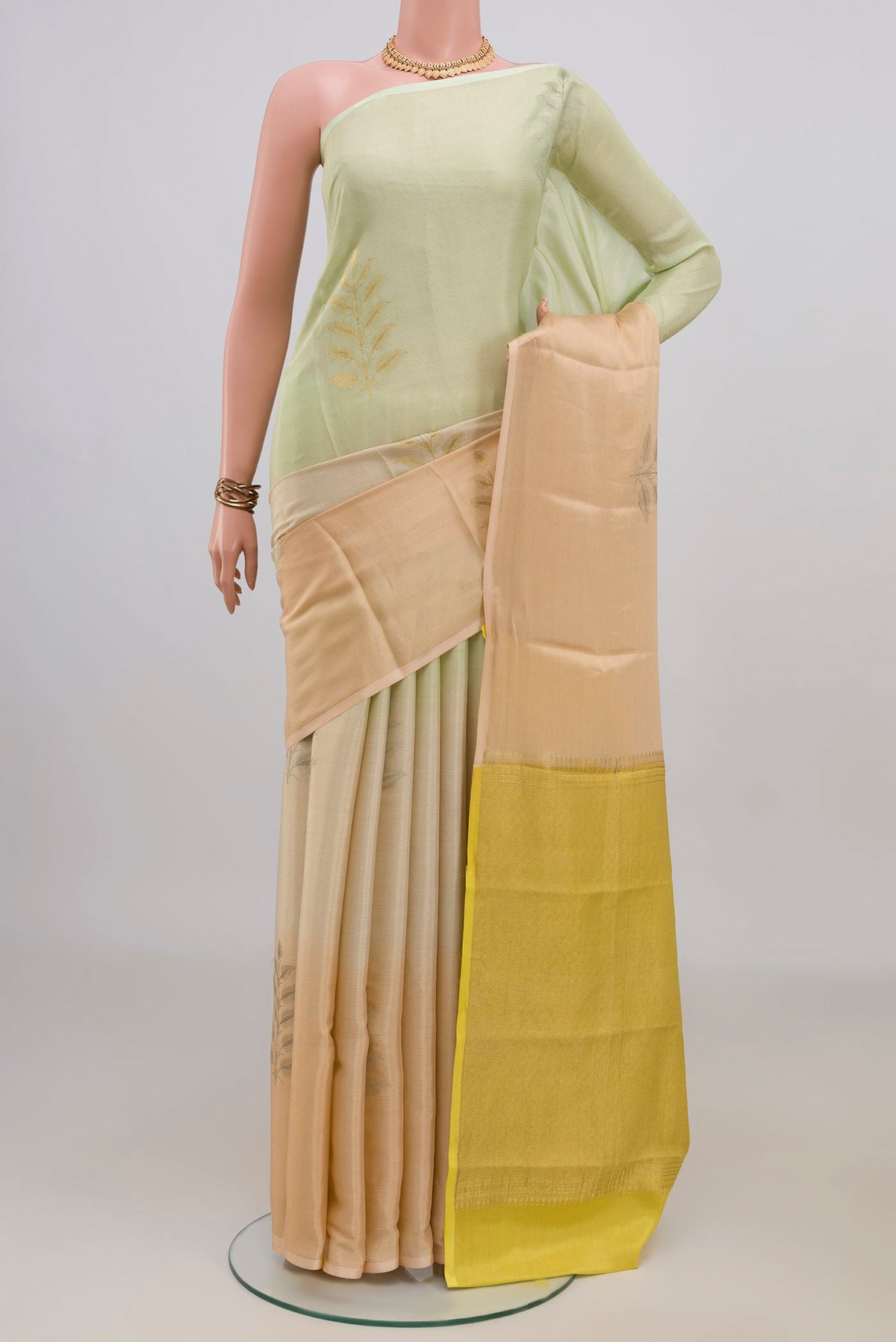Multi Color Crepe Saree with Zari Butta on the body and Without Border.  displayed on a mannequin