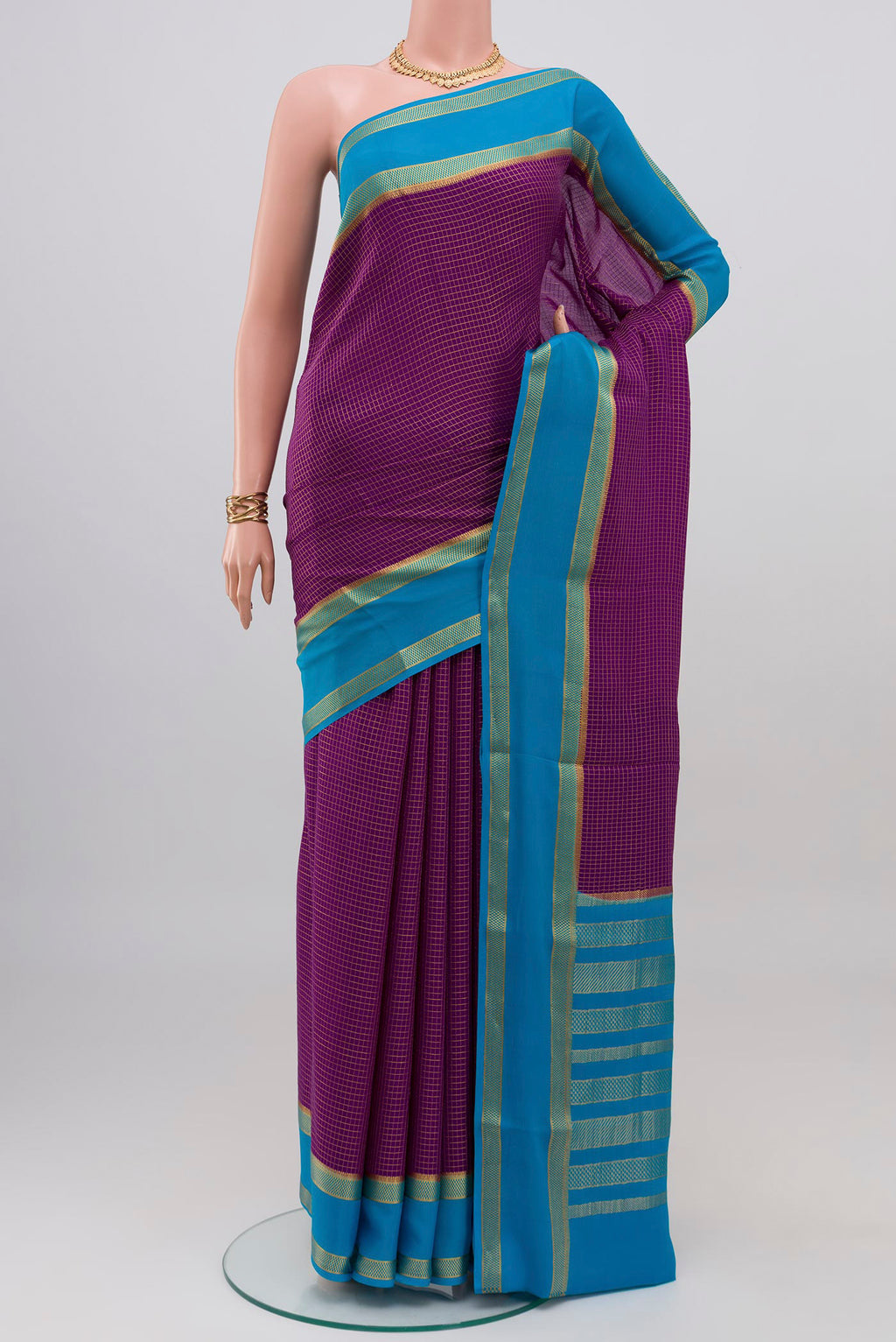 Purple Mysore Crepe Saree with Checked design on the body and Zari Border.  displayed on a mannequin
