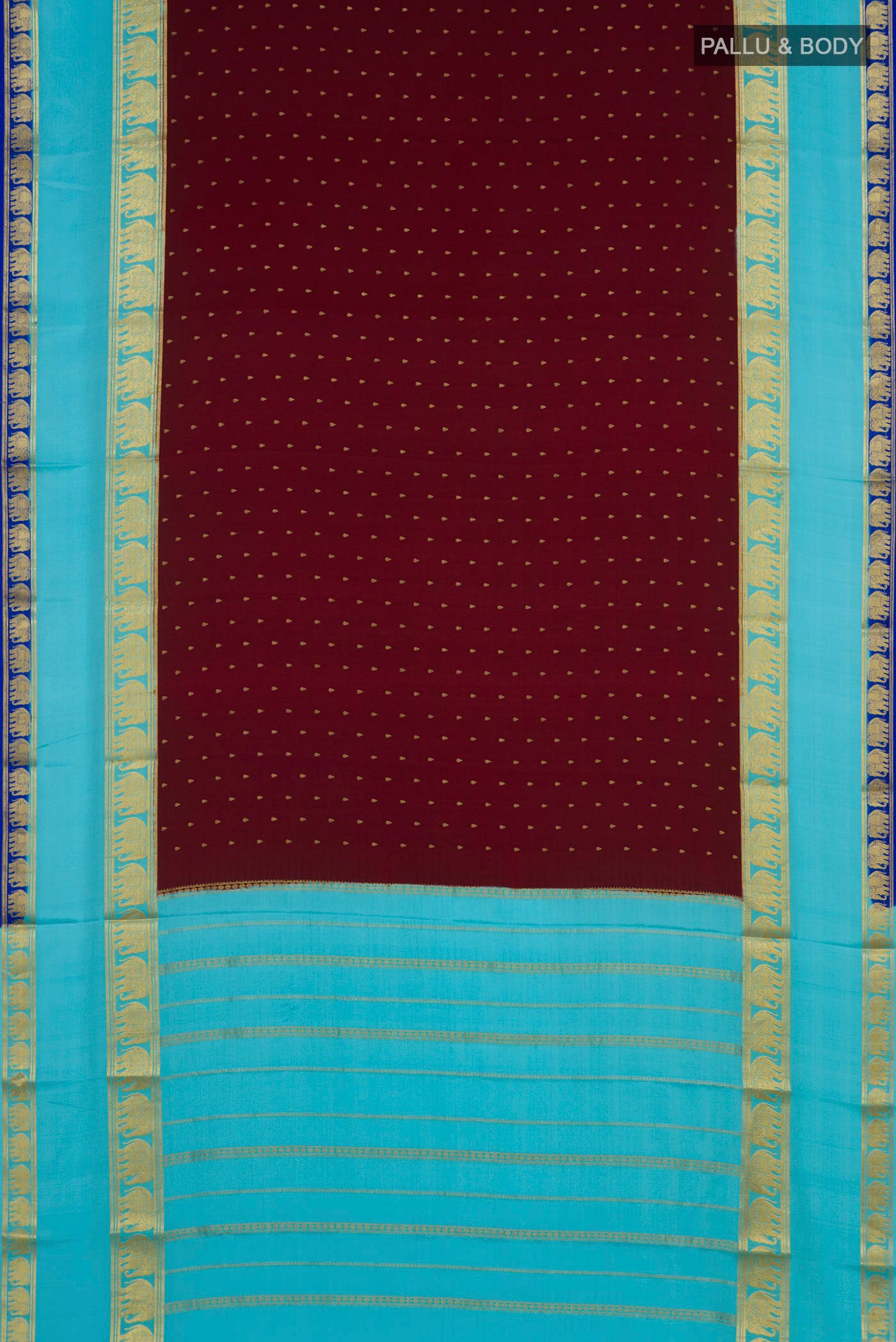 Flat view of Maroon Mysore Crepe Saree with Zari Butta on the body and Zari Border. 