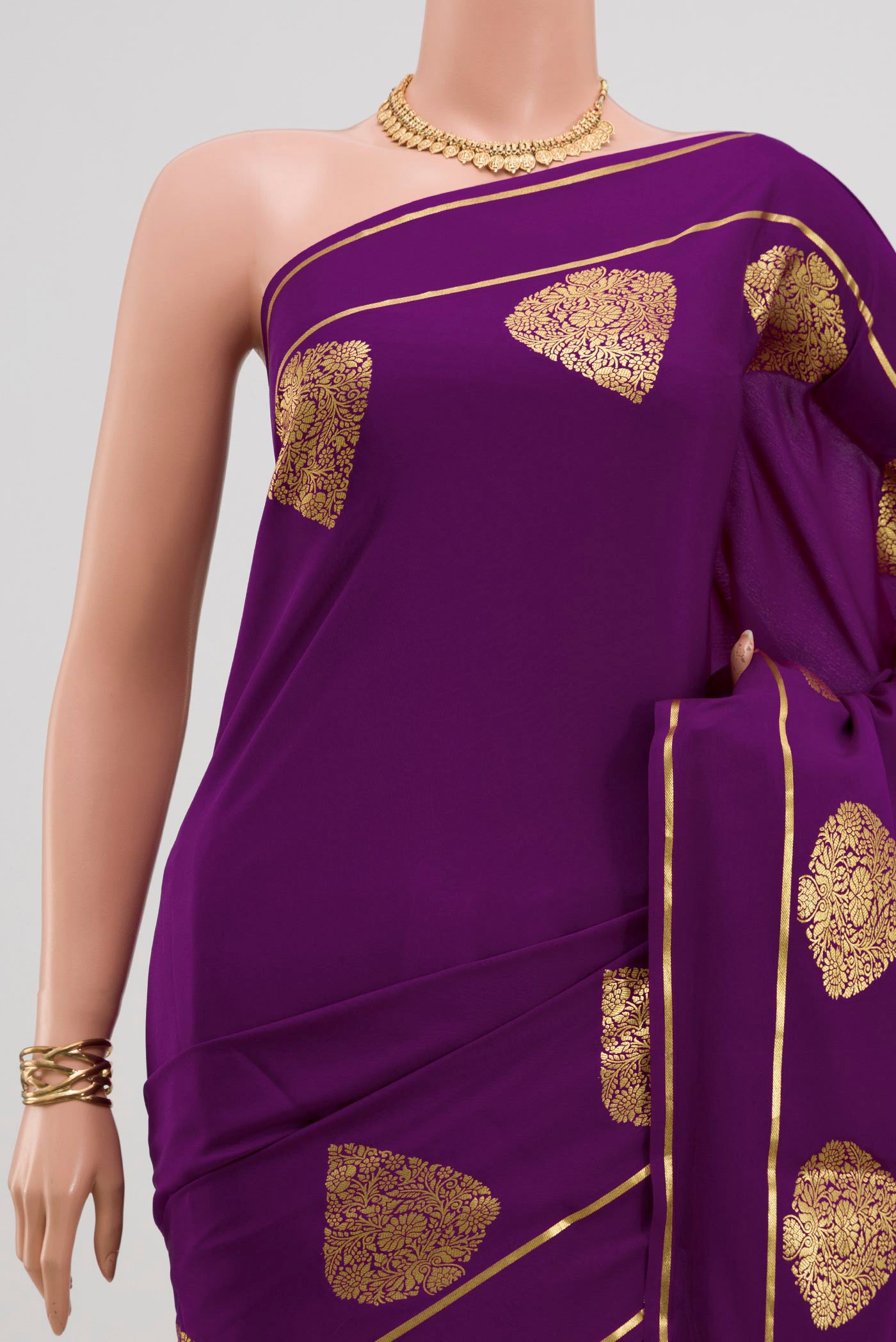 Border image of Purple Crepe Saree with Plain Body and Thin Zari Line. 