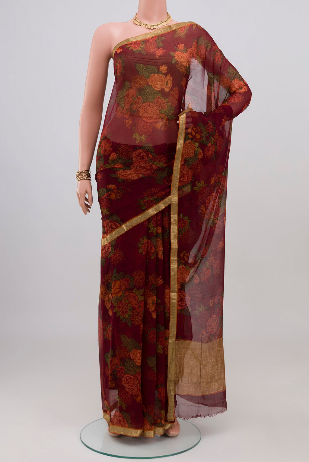 Coffee Brown Mysore Chiffon Saree with Floral Print on the body and Zari Border.  displayed on a mannequin