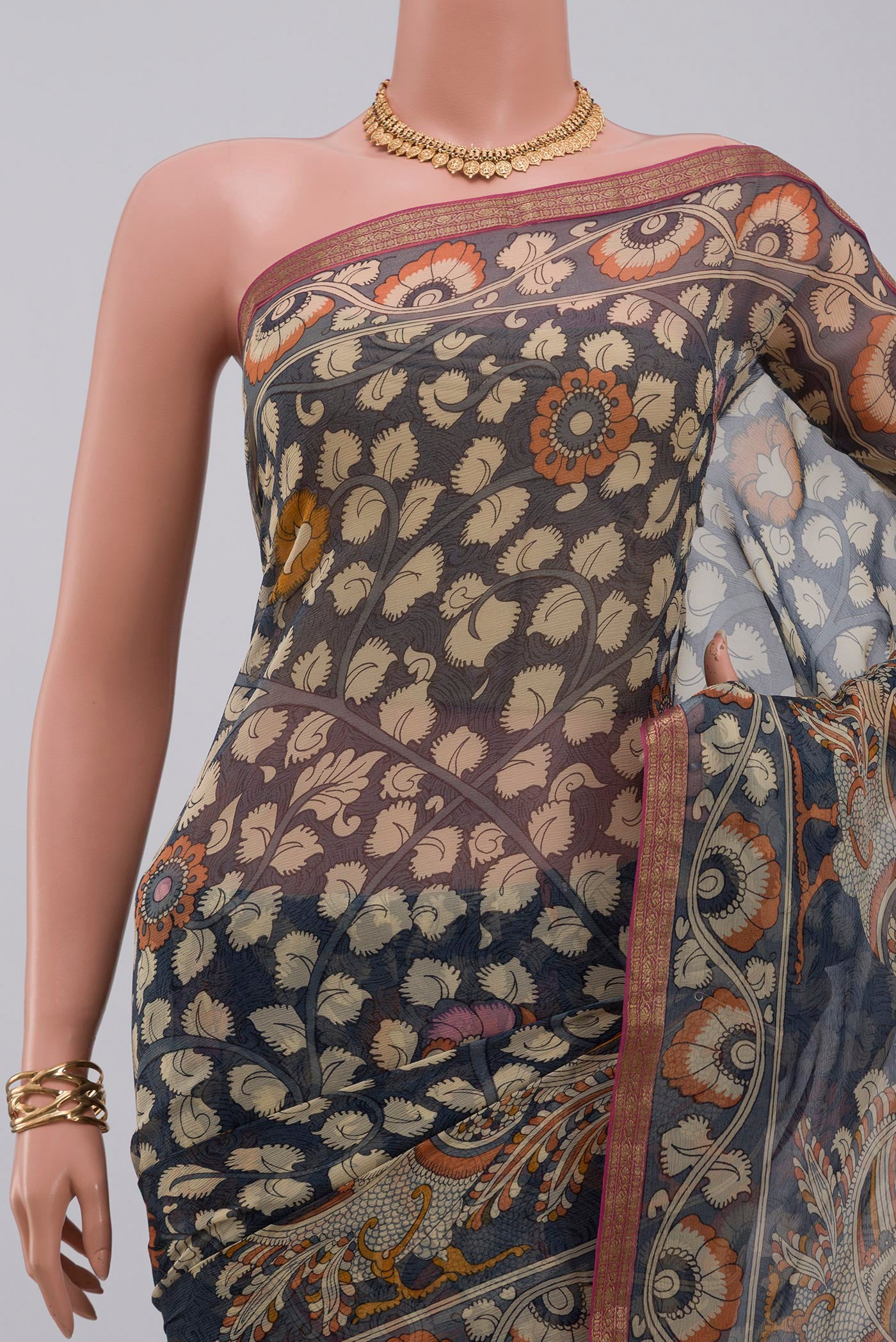 Border image of Blue Grey Chiffon Saree with Printed design on the body and Zari Border. 