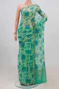 Mint Green Mysore Chiffon Saree with Floral Print on the body and Zari Border.  displayed on a mannequin
