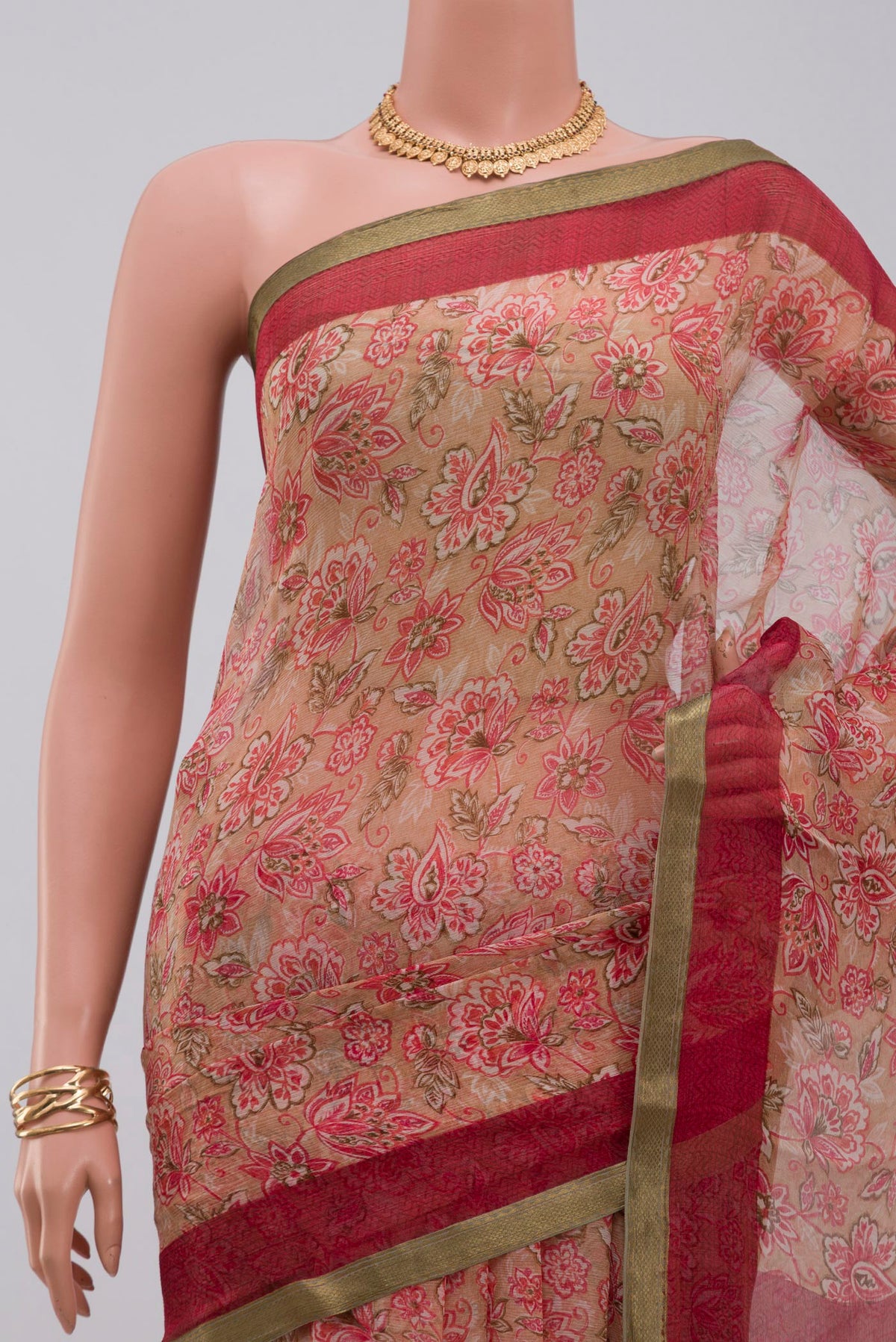 Border image of Beige Chiffon Saree with Printed design on the body and Zari Border. 