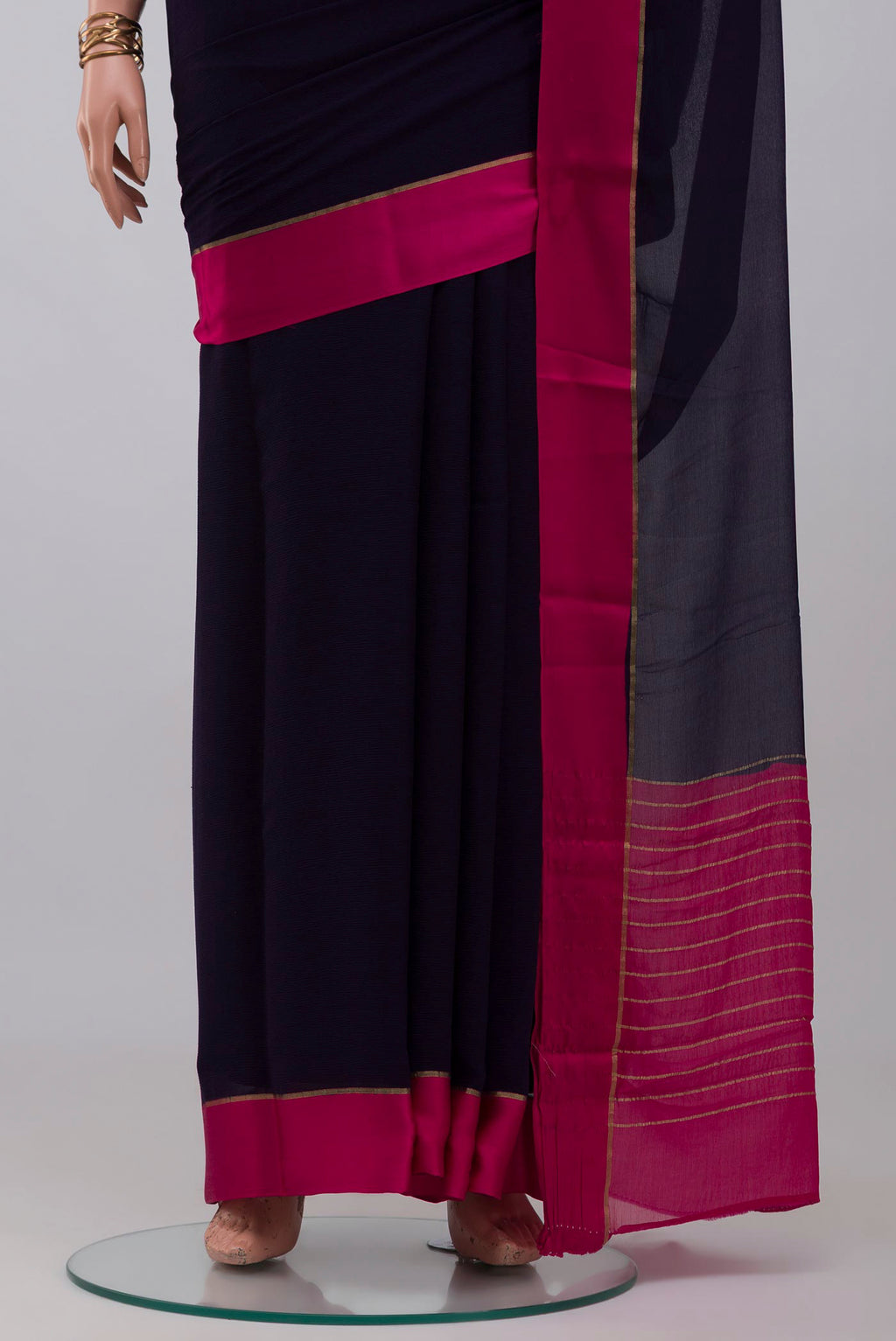 Pleats and pallu of Navy Blue Mysore Chiffon Saree with Plain Body and Plain Border. 