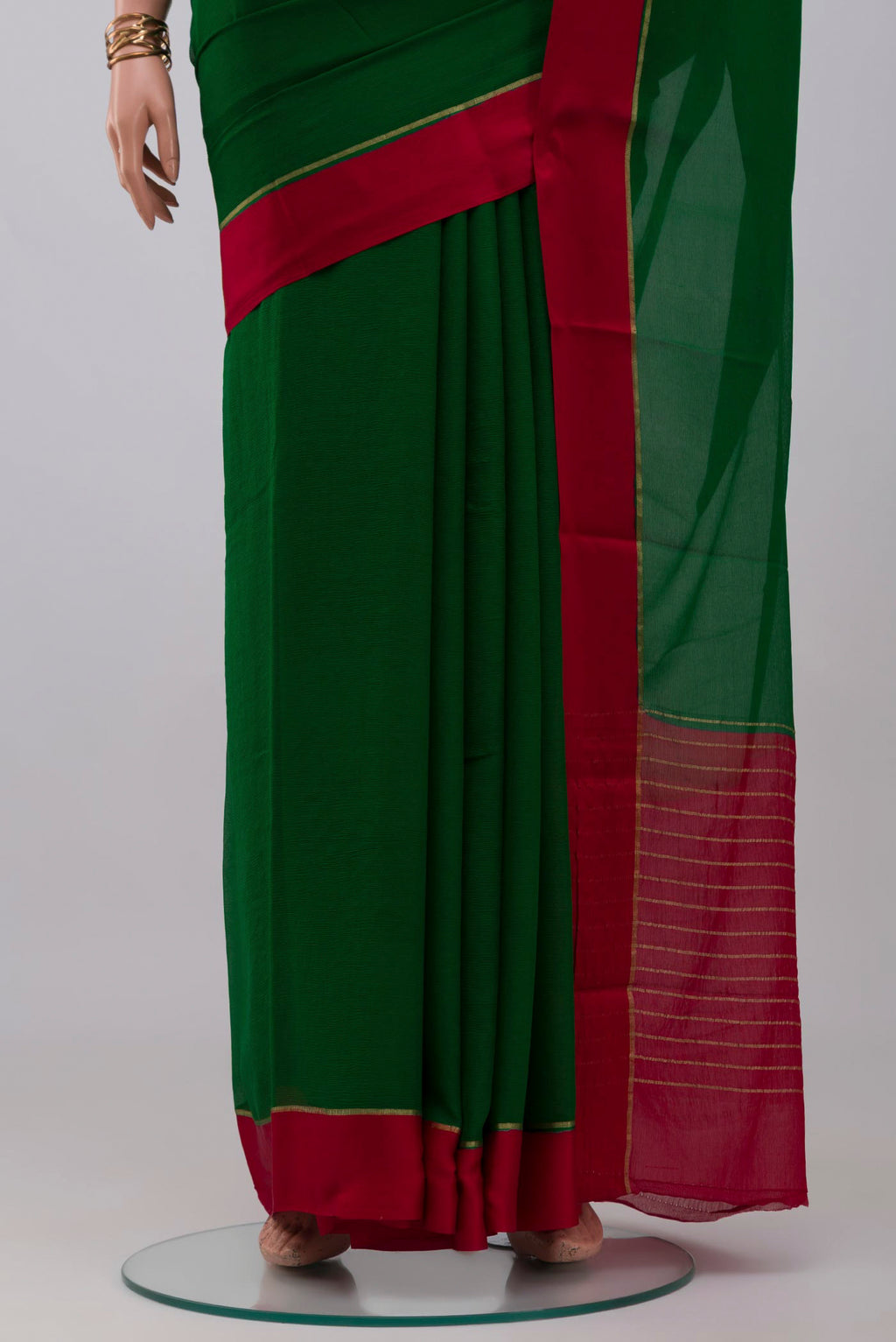 Pleats and pallu of Green Mysore Chiffon Saree with Plain Body and Plain Border. 