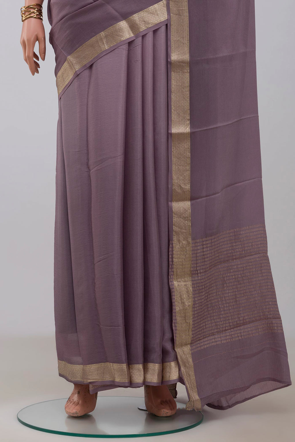 Pleats and pallu of Lavender Mysore Chiffon Saree with Plain Body and Zari Border. 