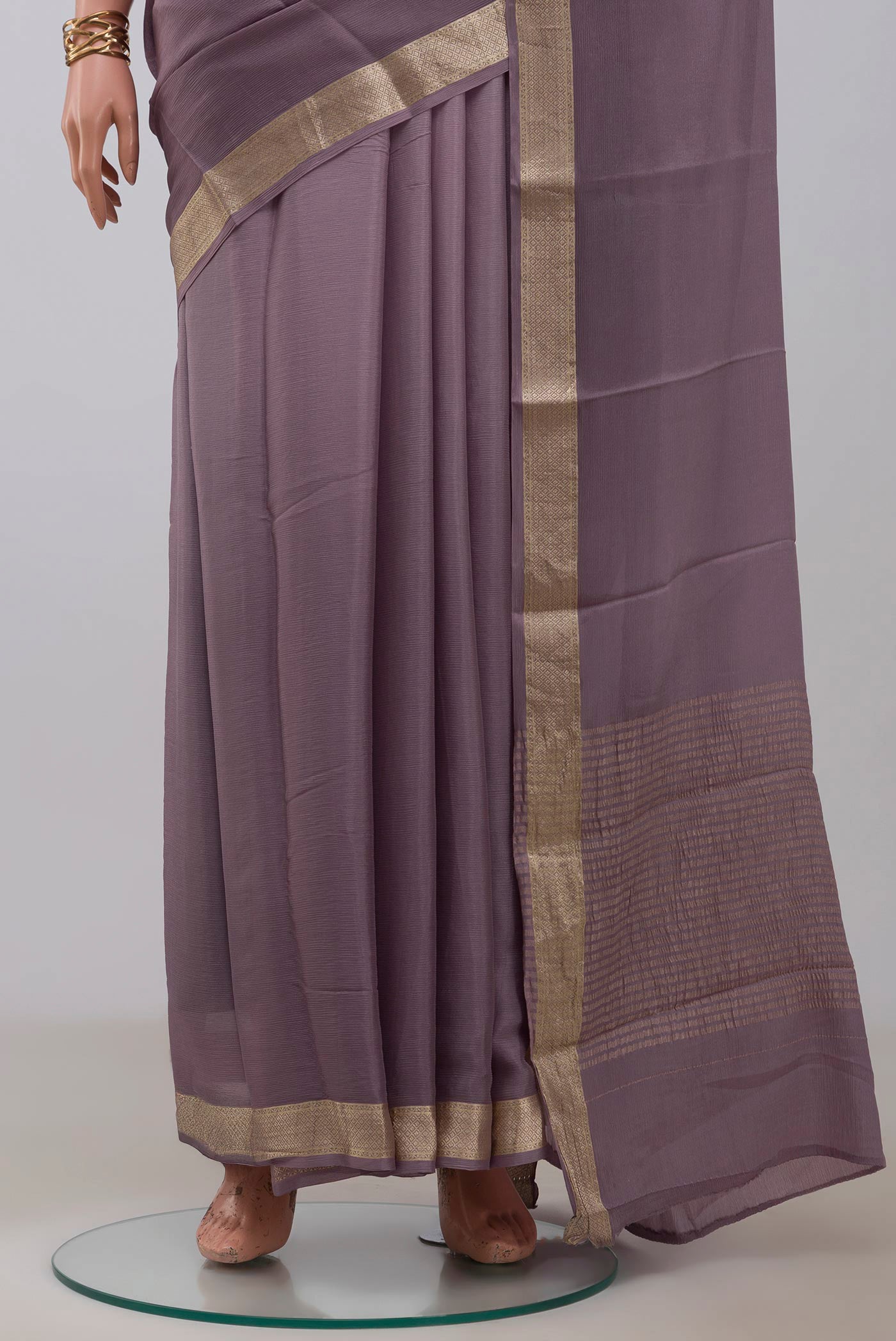 Pleats and pallu of Lavender Mysore Chiffon Saree with Plain Body and Zari Border. 