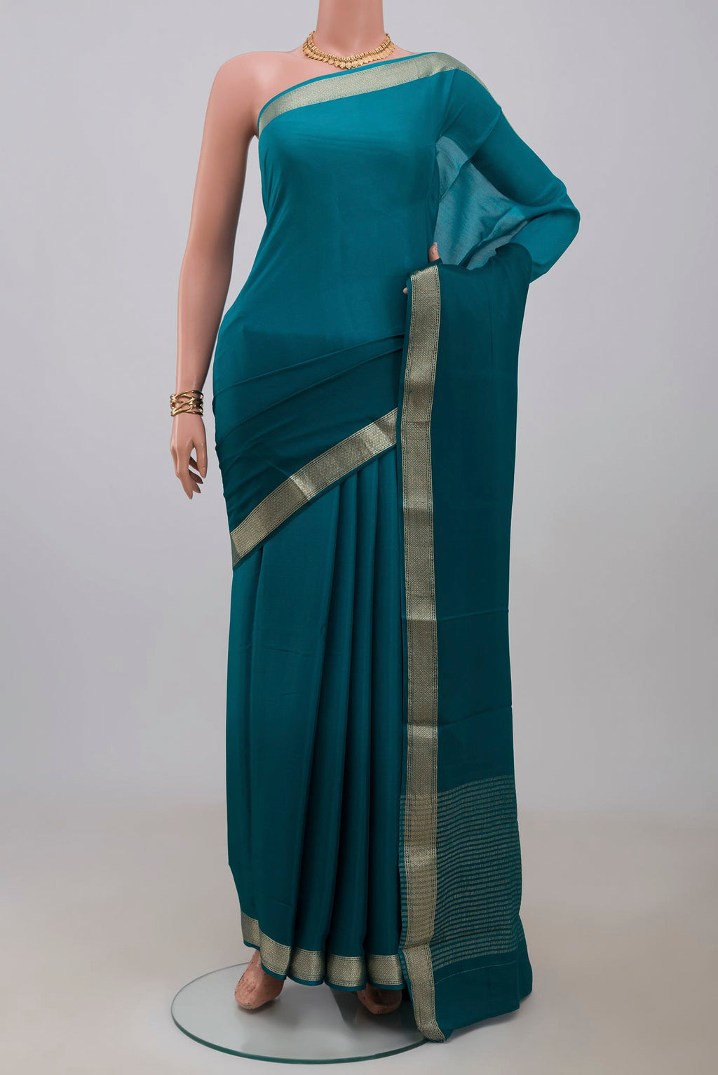 Blue Mysore Chiffon Saree with Ombre design on the body and Zari Border.  displayed on a mannequin