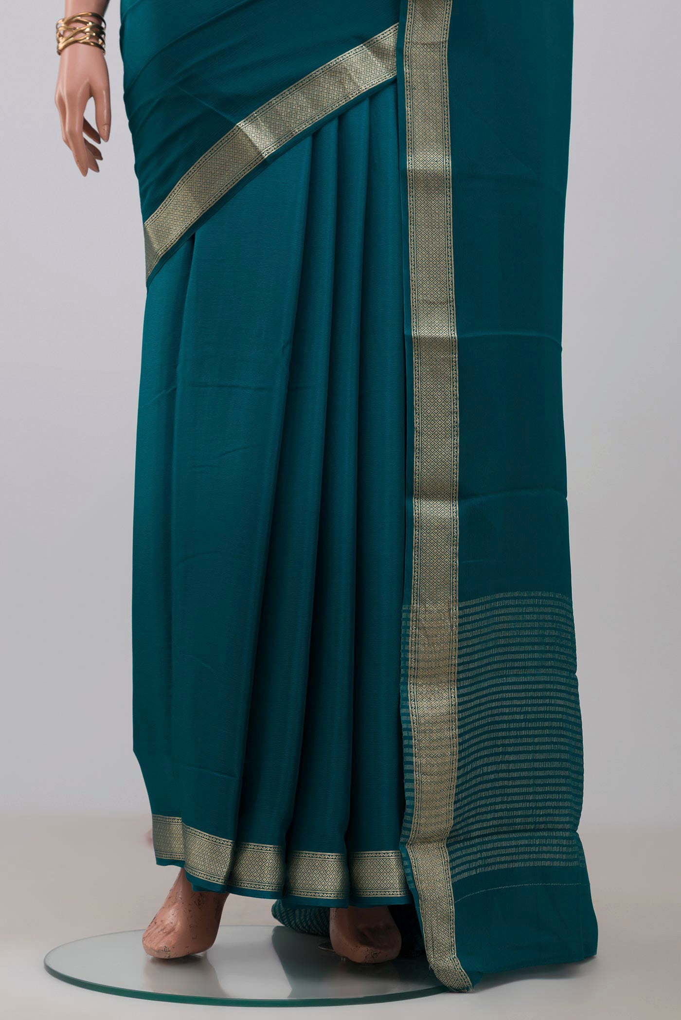 Pleats and pallu of Blue Mysore Chiffon Saree with Ombre design on the body and Zari Border. 
