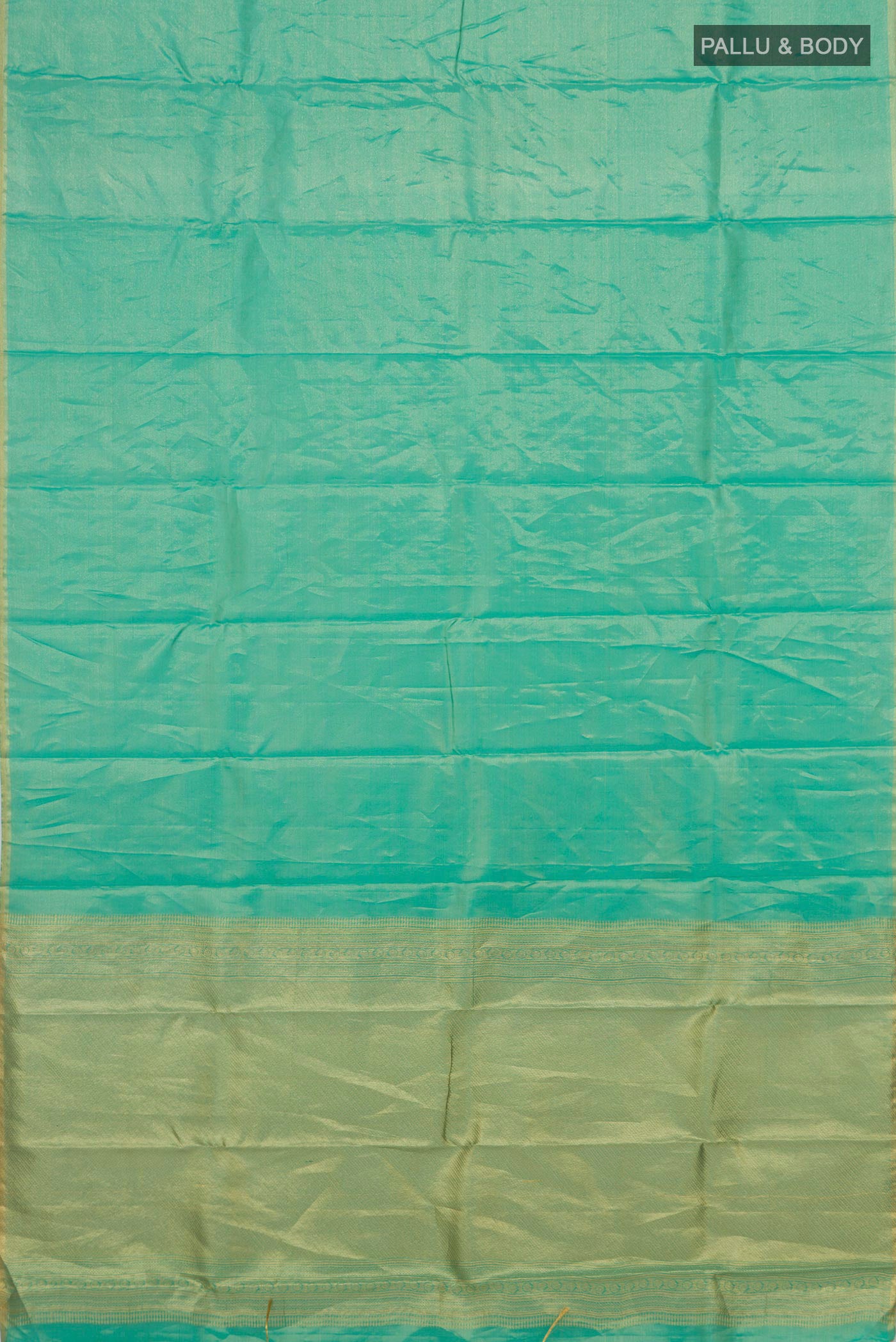 Flat view of Sea Green Soft Silk Saree with Plain Body and Zari Border. 